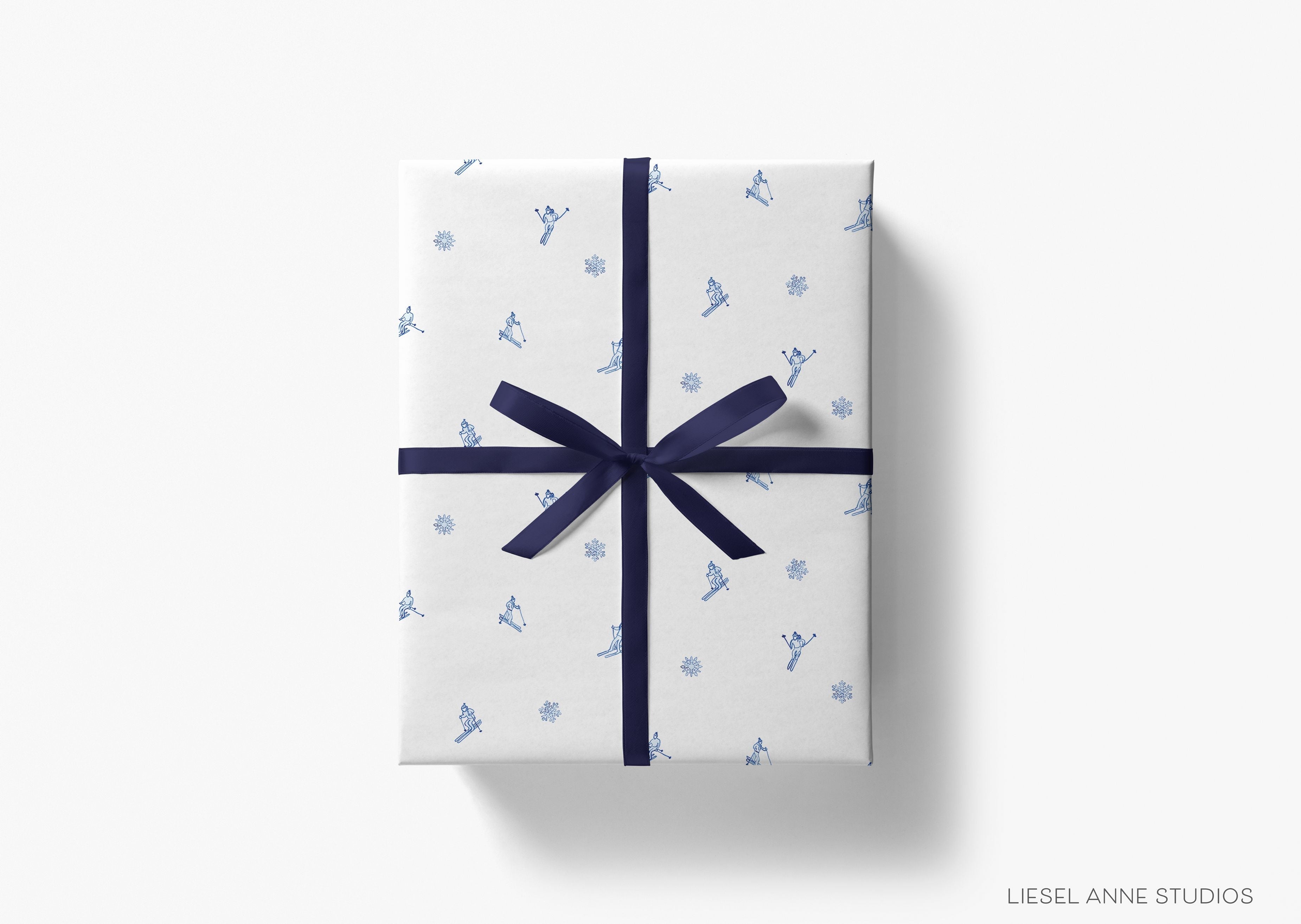 Après Ski White and Blue Gift Wrap-This matte finish gift wrap features our hand-painted watercolor snowflakes and skiers design. It makes a perfect wrapping paper for a holiday present. -The Singing Little Bird