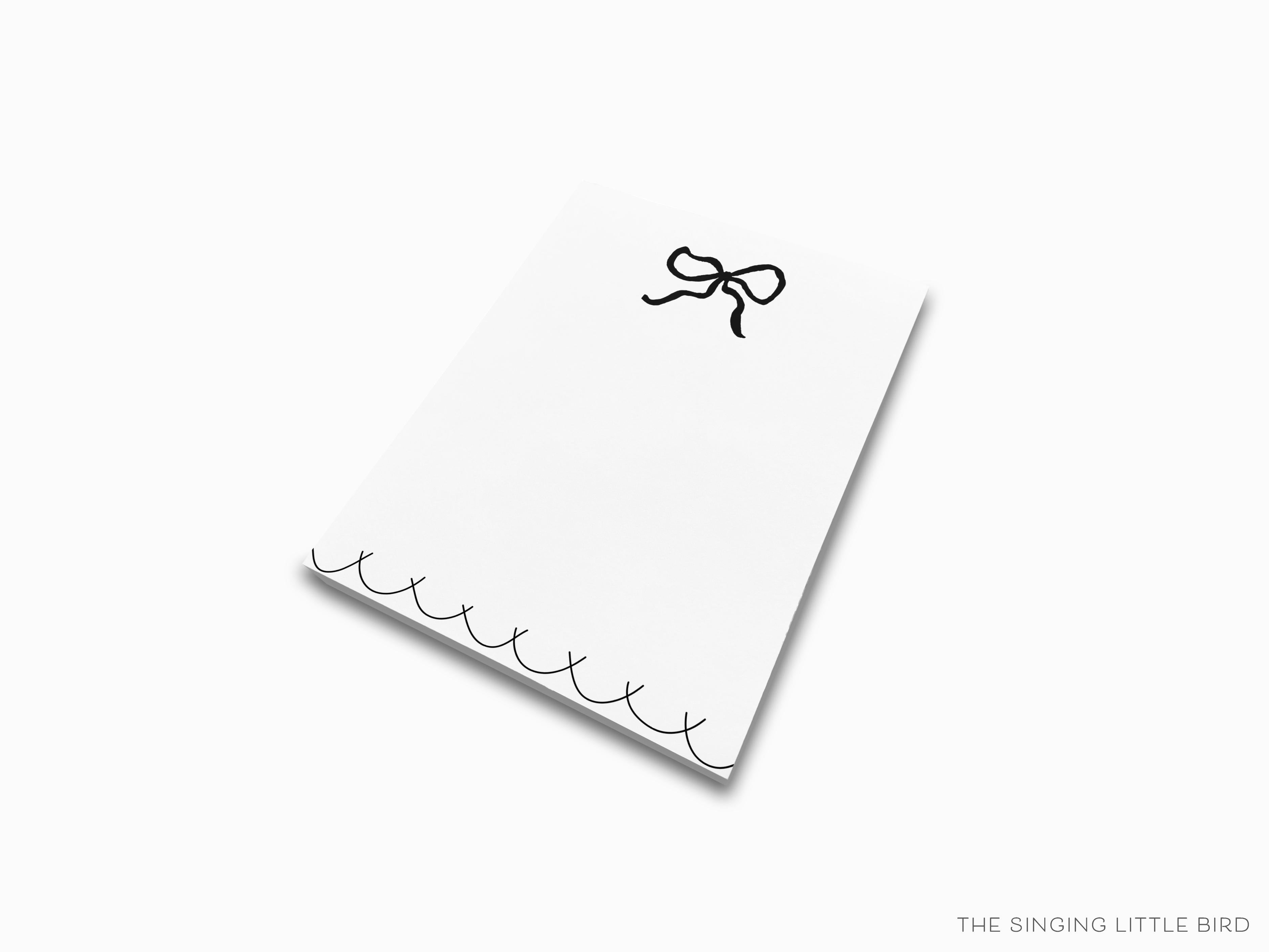 Black Bow Notepad-These notepads feature our hand-painted watercolor bow, printed in the USA on a beautiful smooth stock. You choose which size you want (or bundled together for a beautiful gift set) and makes a great gift for the checklist and feminine bow lover in your life.-The Singing Little Bird