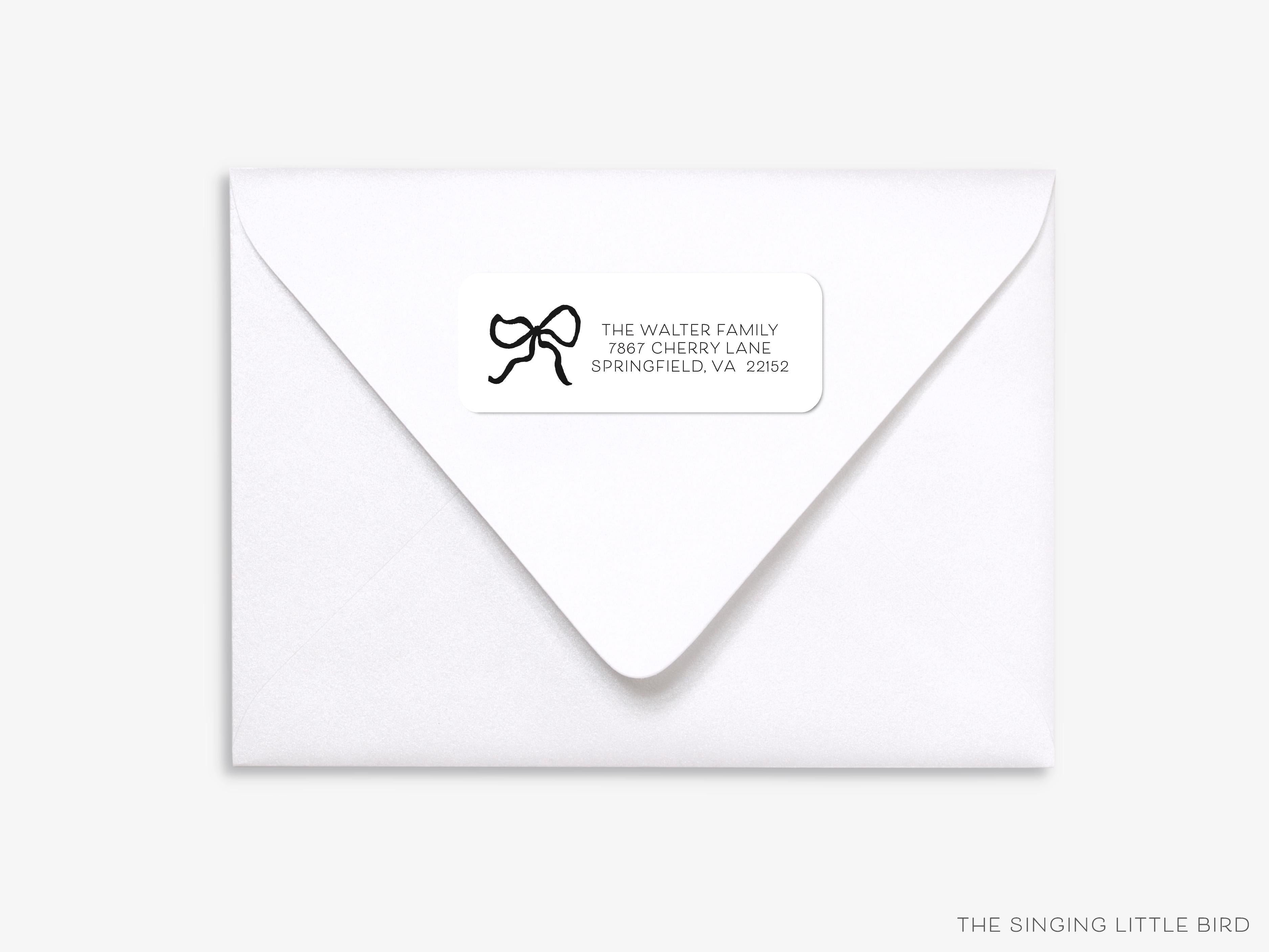 Black Bow Return Address Labels-These personalized return address labels are 2.625" x 1" and feature our hand-painted watercolor bow, printed in the USA on beautiful matte finish labels. These make great gifts for yourself or the bow lover.-The Singing Little Bird