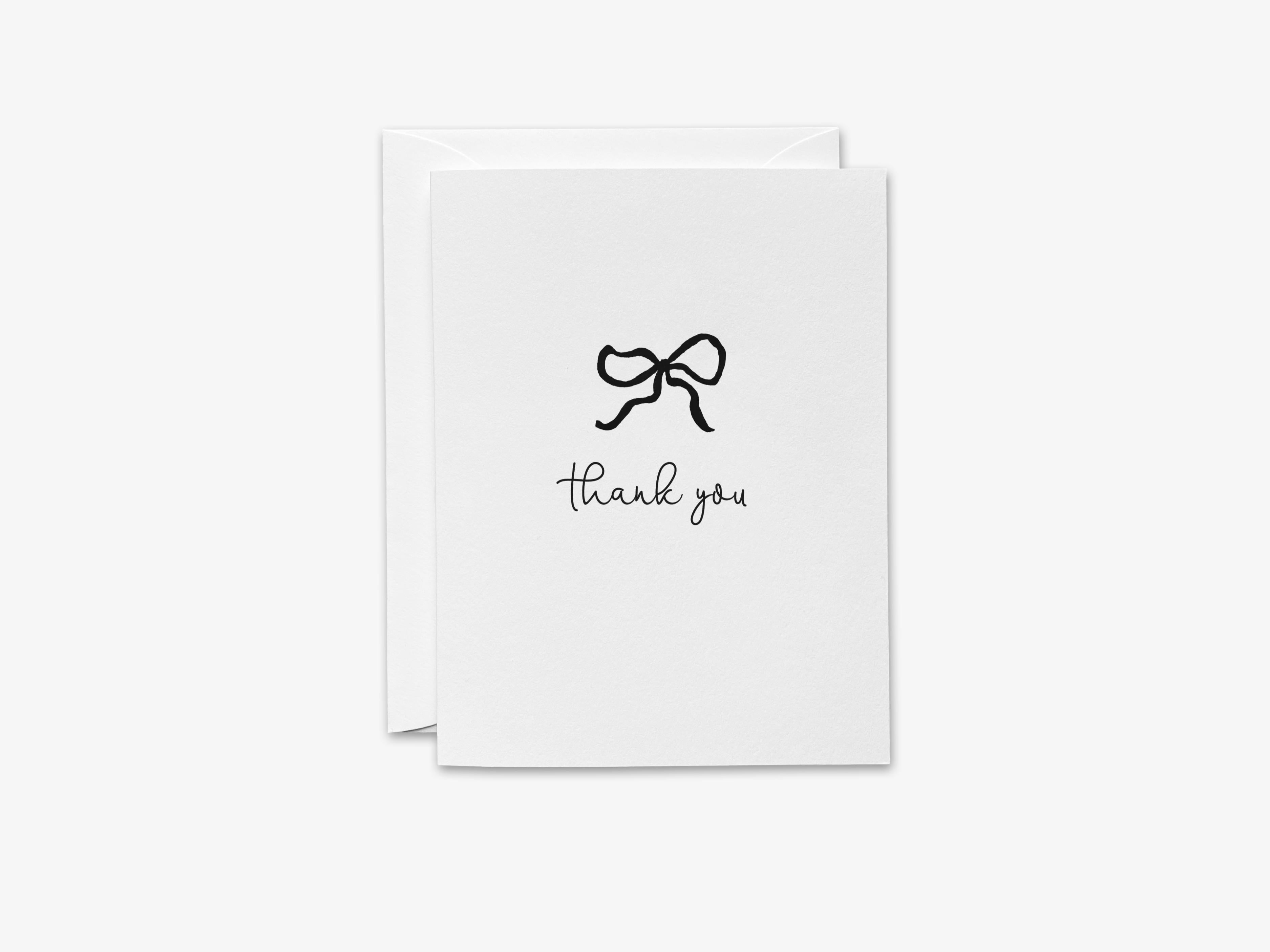Black Bow Thank You Greeting Card-These folded greeting cards are 4.25x5.5 and feature our hand-painted black bow, printed in the USA on 100lb textured stock. They come with a White envelope and make a great thank you card for the black and white chic lover in your life.-The Singing Little Bird
