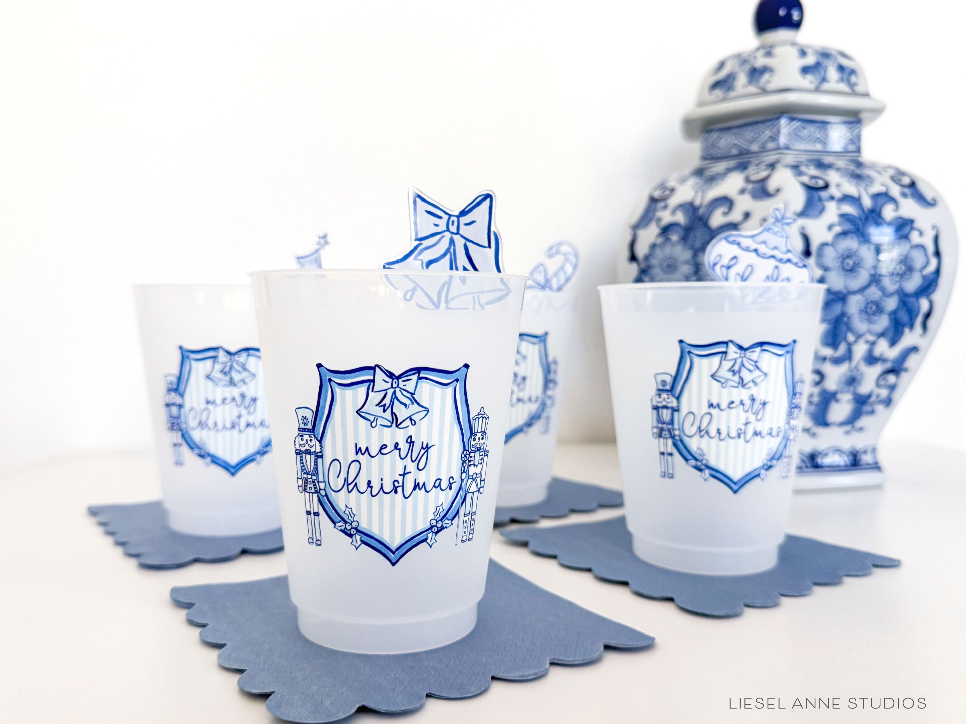 Blue & White Christmas Crest 16oz Shatterproof Cups [Set of 8]-These shatterproof cups feature our hand-painted preppy Blue & White Christmas Crest design and make great party decorations for your holiday gatherings, christmas parties, christmas cookie bake offs and more! They come in sets of 8 and are re-usable for other parties to come or make wonderful party favors!-The Singing Little Bird