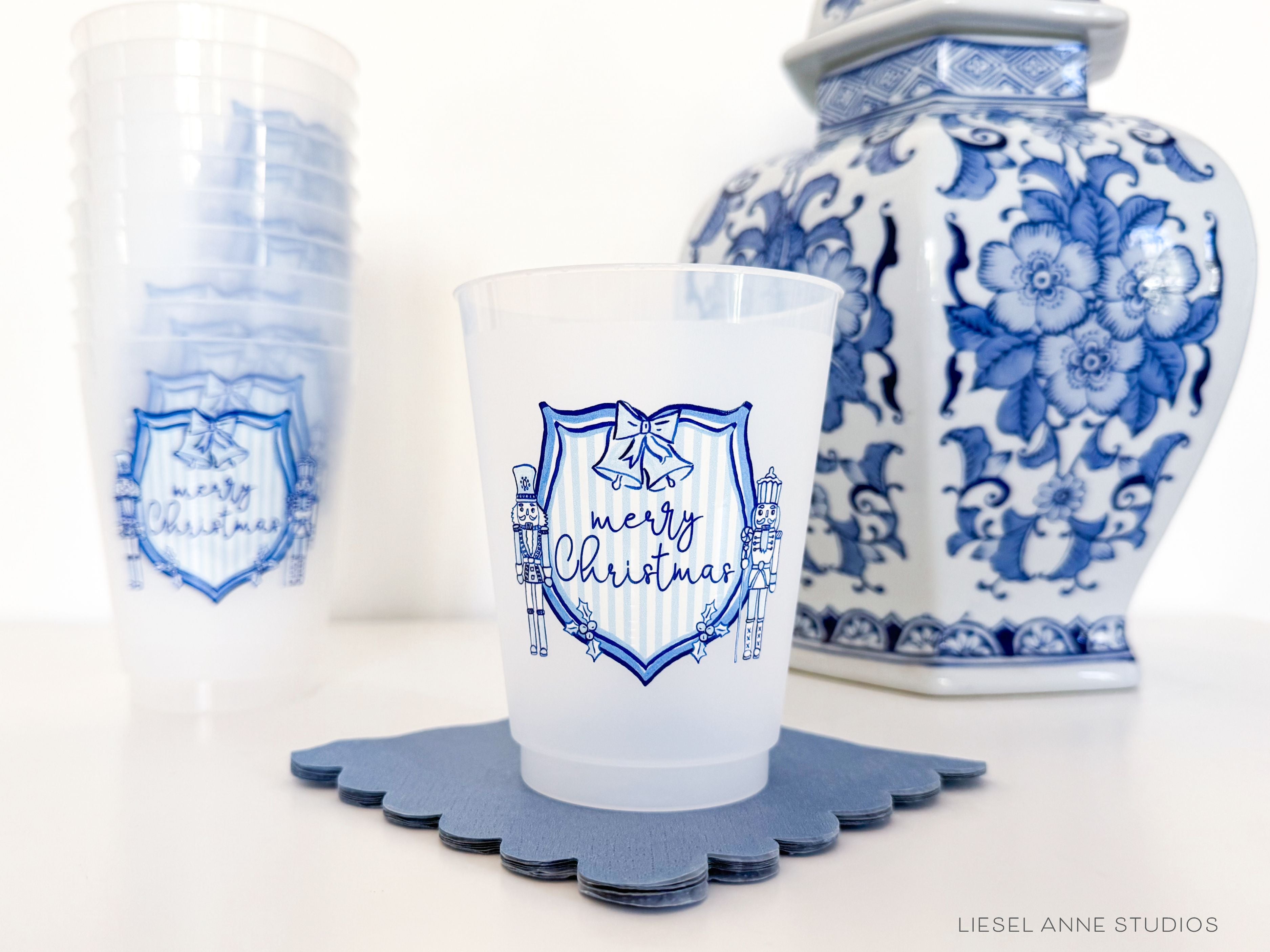 Blue & White Christmas Crest 16oz Shatterproof Cups [Set of 8]-These shatterproof cups feature our hand-painted preppy Blue & White Christmas Crest design and make great party decorations for your holiday gatherings, christmas parties, christmas cookie bake offs and more! They come in sets of 8 and are re-usable for other parties to come or make wonderful party favors!-The Singing Little Bird