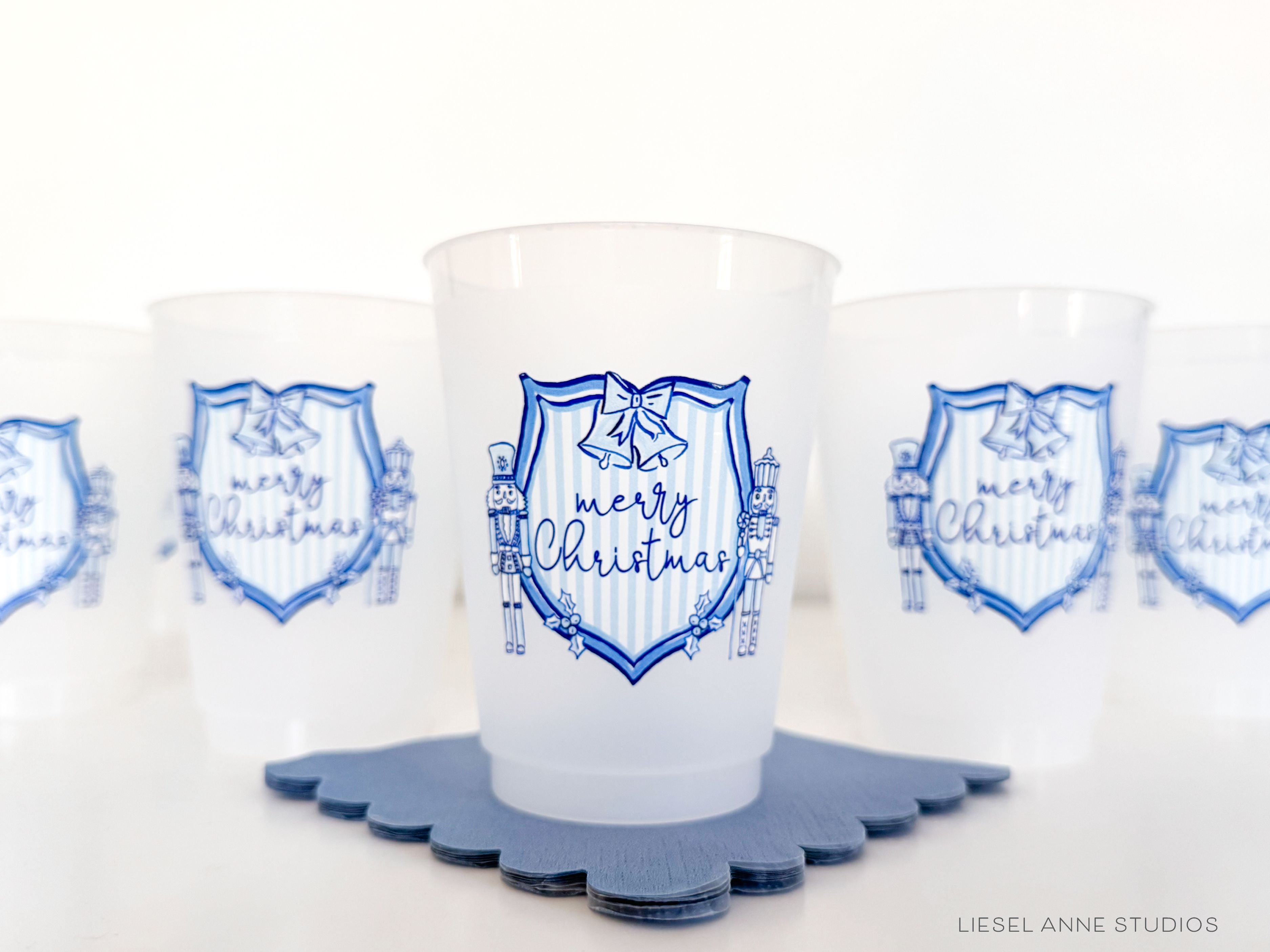 Blue & White Christmas Crest 16oz Shatterproof Cups [Set of 8]-These shatterproof cups feature our hand-painted preppy Blue & White Christmas Crest design and make great party decorations for your holiday gatherings, christmas parties, christmas cookie bake offs and more! They come in sets of 8 and are re-usable for other parties to come or make wonderful party favors!-The Singing Little Bird