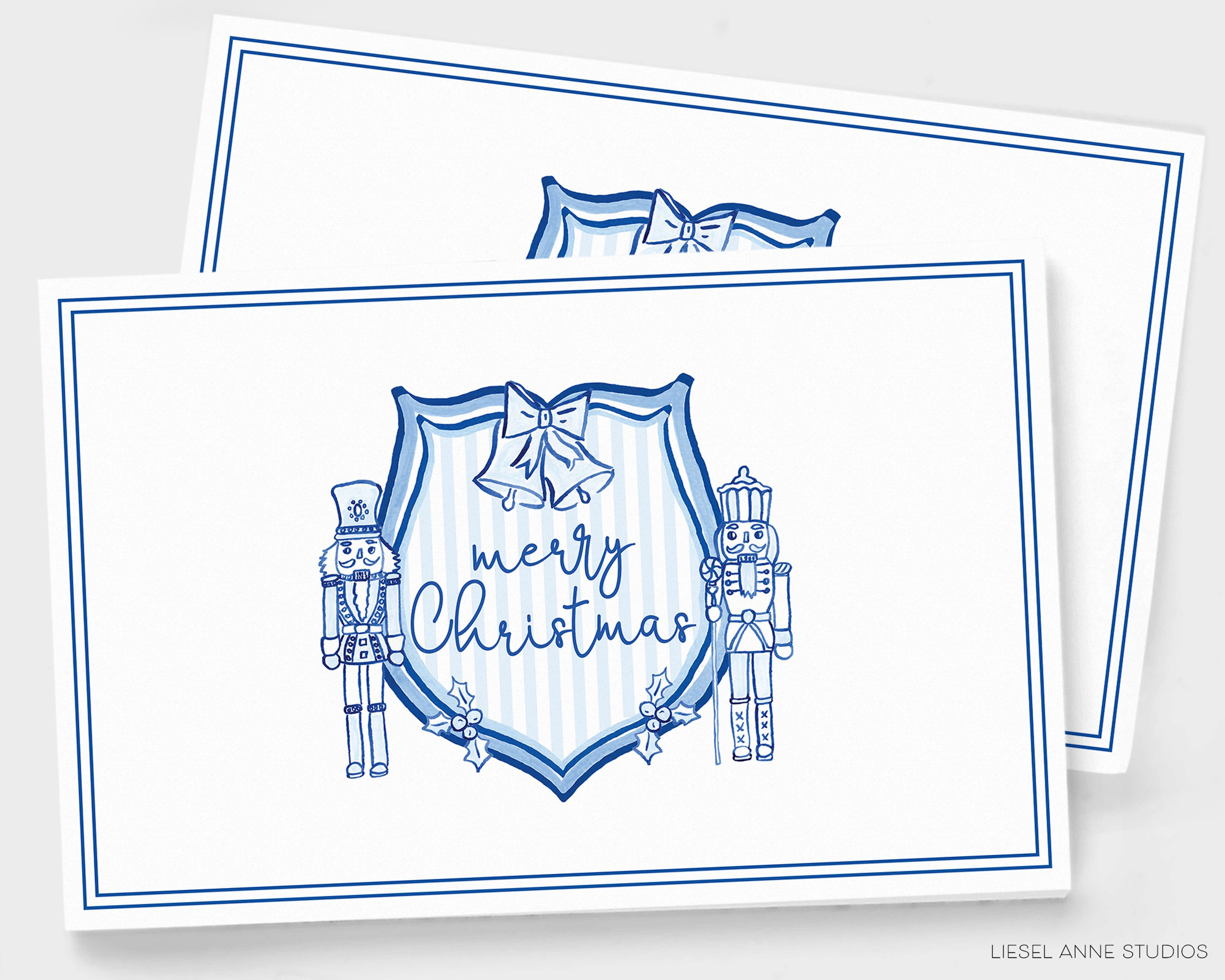 Blue & White Christmas Crest Paper Placemat Pad-These placemat pads feature our hand-painted watercolor nutcracker Christmas Crest, printed in the USA on a beautiful smooth stock. They add a touch of charm and convenience to any holiday table setting and party decor. A great gift for the Nutcracker lover in your life.-The Singing Little Bird