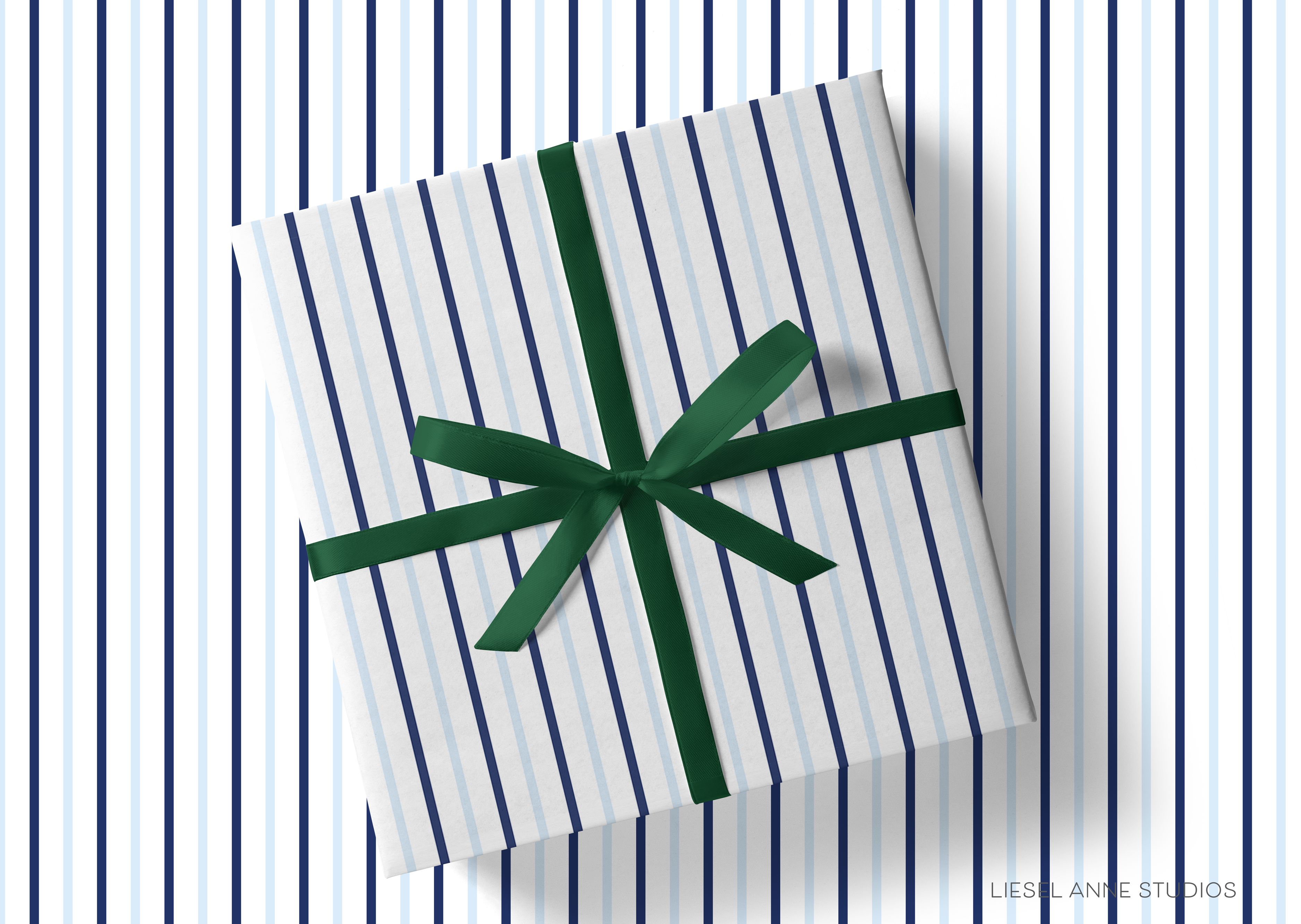 Blue and White Stripe Gift Wrap-This matte finish gift wrap features our hand-painted watercolor stripes. It makes a perfect wrapping paper for a holiday present. -The Singing Little Bird