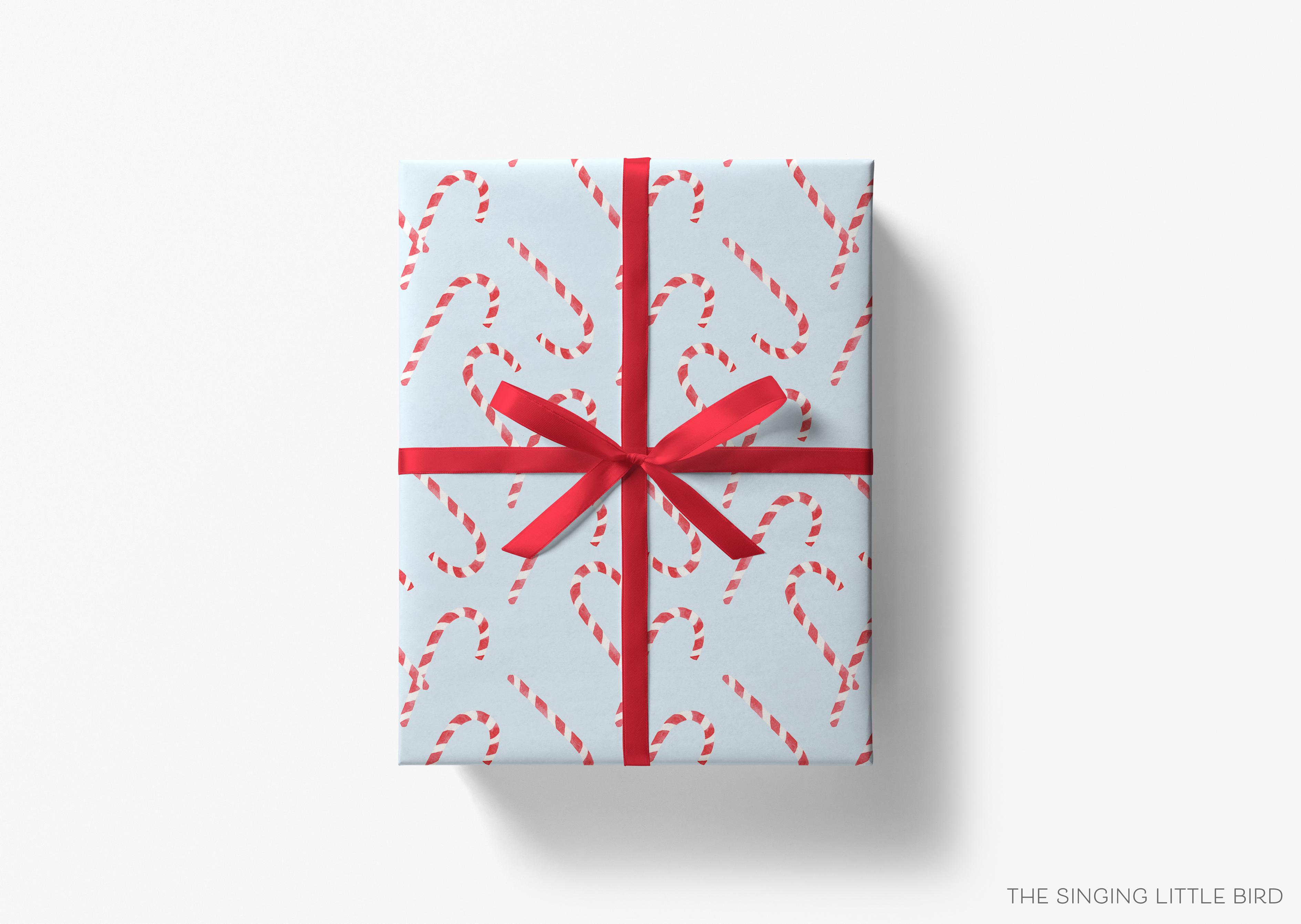 Candy Cane Light Blue Christmas Gift Wrap-This matte finish gift wrap features our hand-painted watercolor gingerbread candy canes. It makes a perfect wrapping paper for a holiday present. -The Singing Little Bird