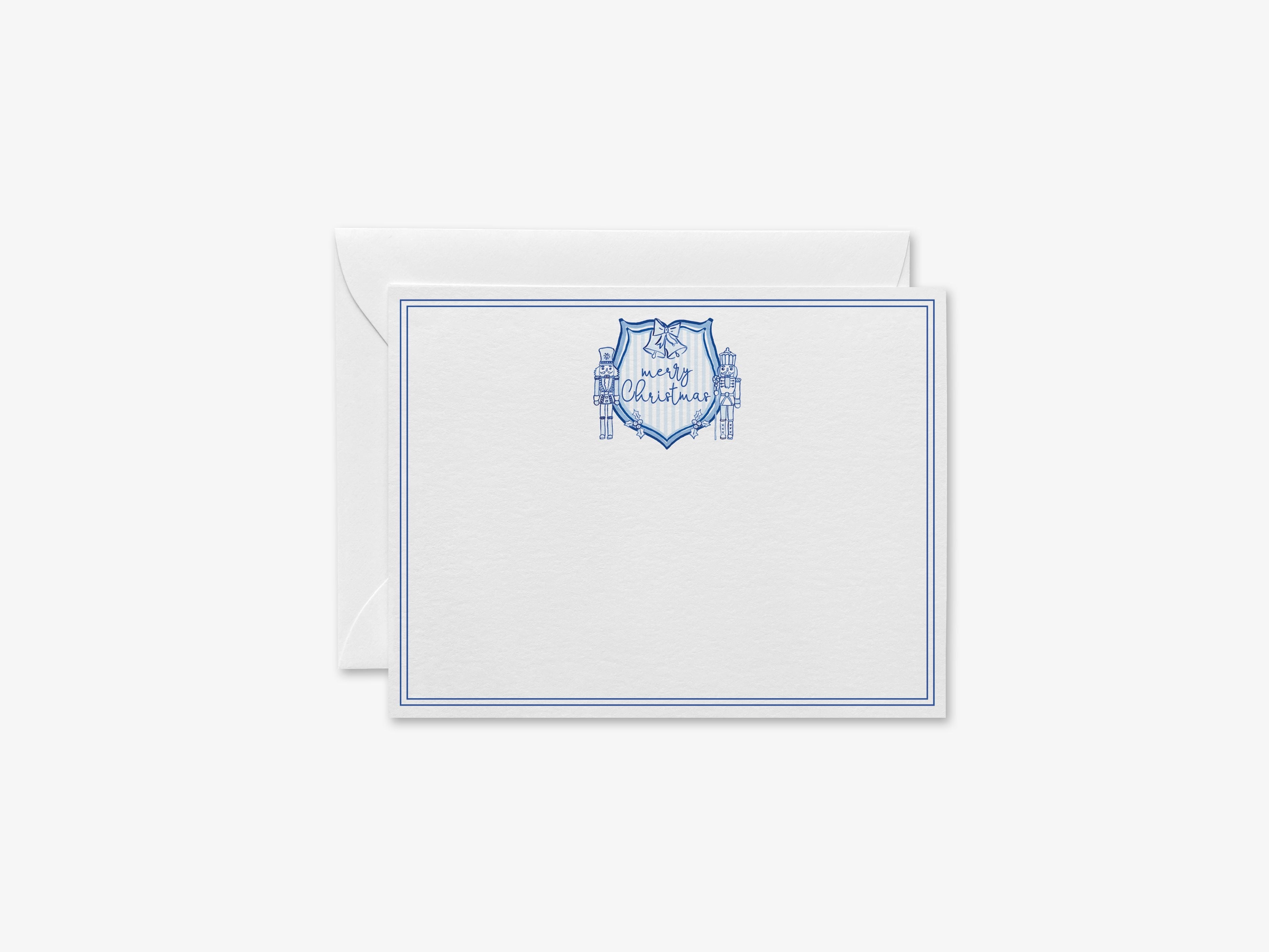 Christmas Crest Blue & White Flat Notes [Sets of 8]-These flat notecards are 4.25x5.5 and feature our hand-painted watercolor nutcracker crest, printed in the USA on 120lb textured stock. They come with white envelopes and make great thank yous and gifts for the blue and white Christmas lover in your life.-The Singing Little Bird