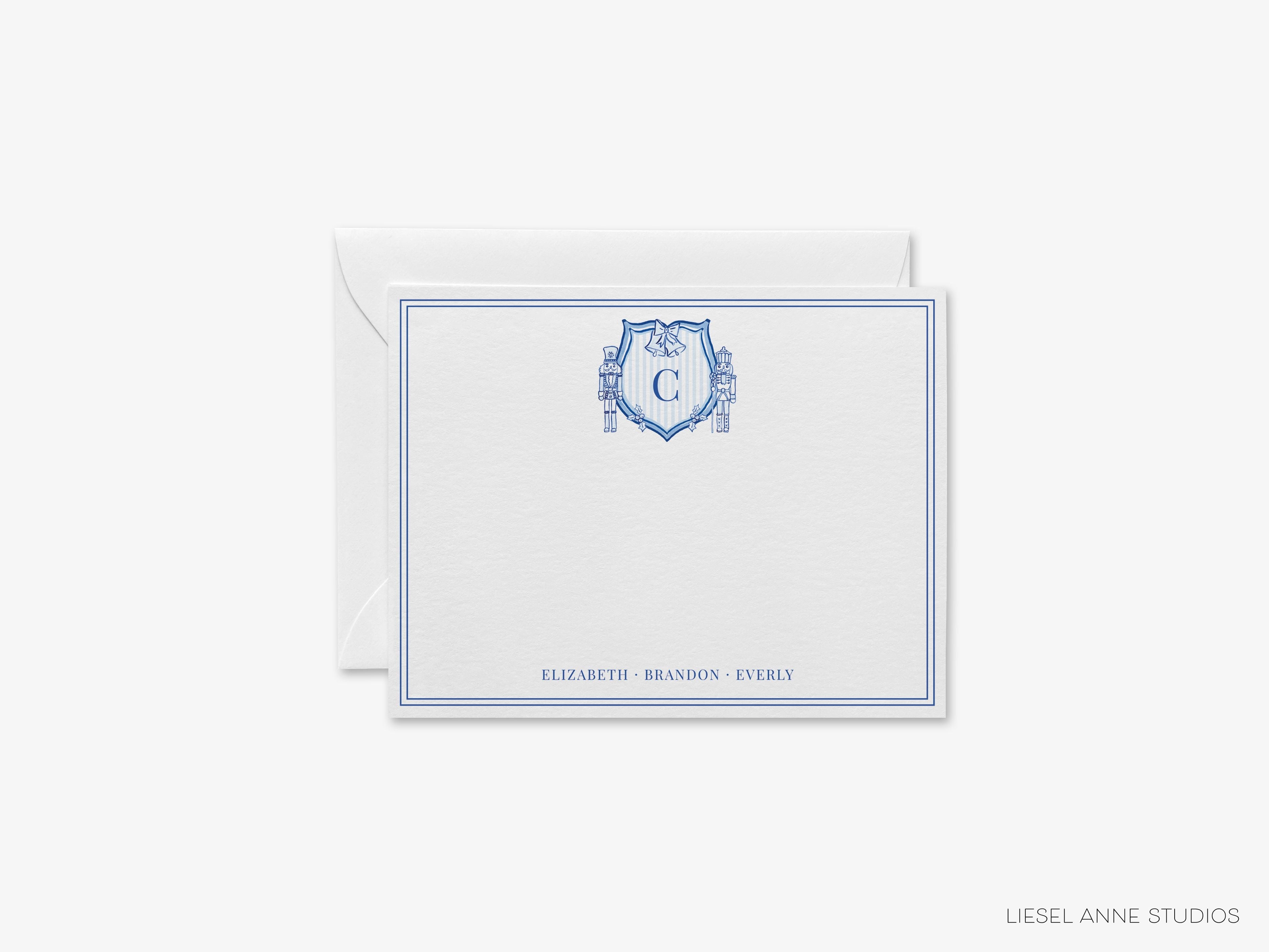 Christmas Crest Blue & White Flat Notes-These personalized flat notecards are 4.25x5.5 and feature our hand-painted watercolor striped nutcracker crest, printed in the USA on 120lb textured stock. They come with your choice of envelopes and make great thank you and gifts for the blue and white holiday lover in your life.-The Singing Little Bird