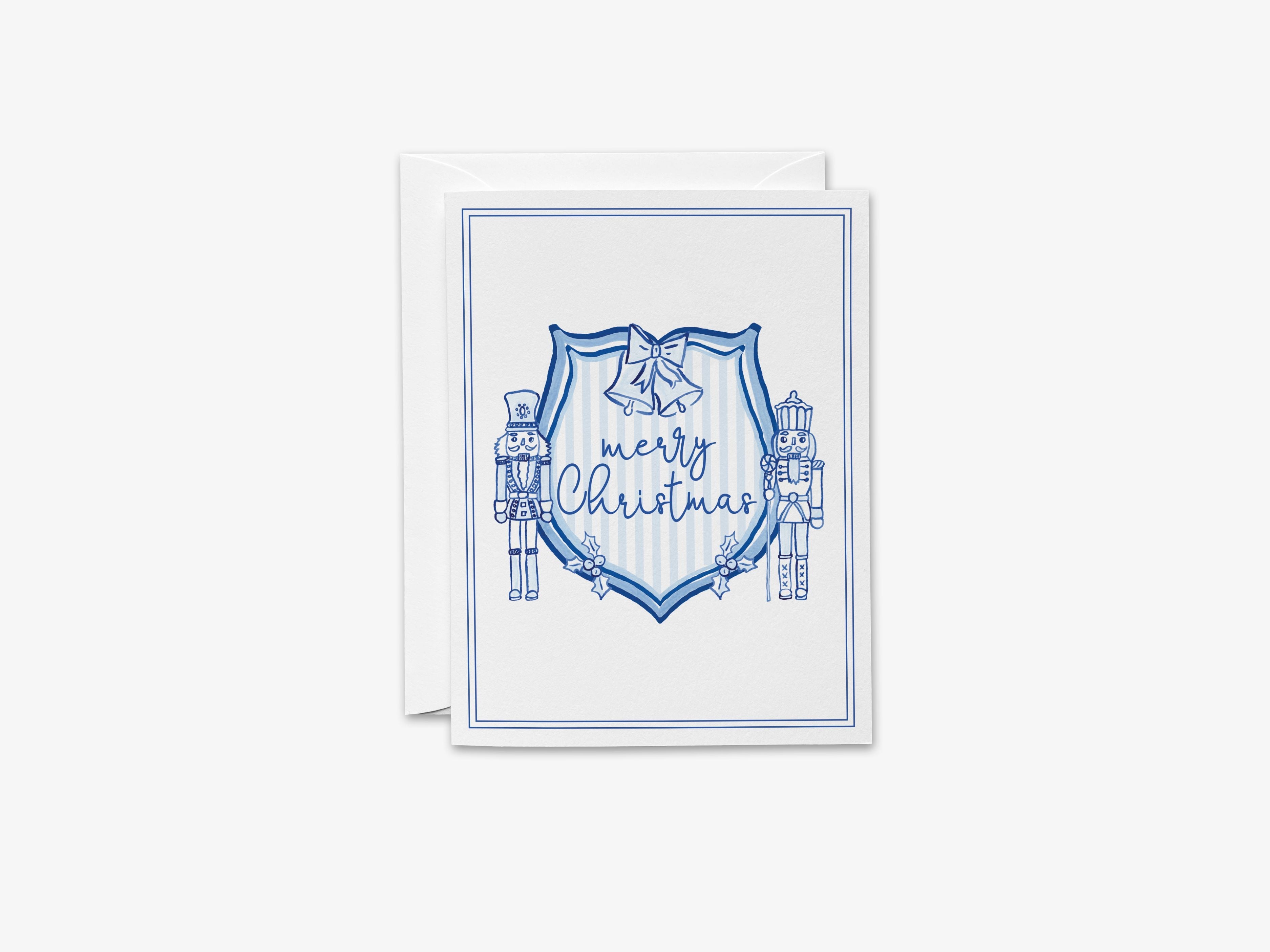 Christmas Crest Blue and White Cards-These folded greeting cards are 4.25x5.5 and feature our hand-painted Nutcracker Crest, printed in the USA on 100lb textured stock. They come with a White envelope and make a great Christmas card for the holiday lover in your life.-The Singing Little Bird