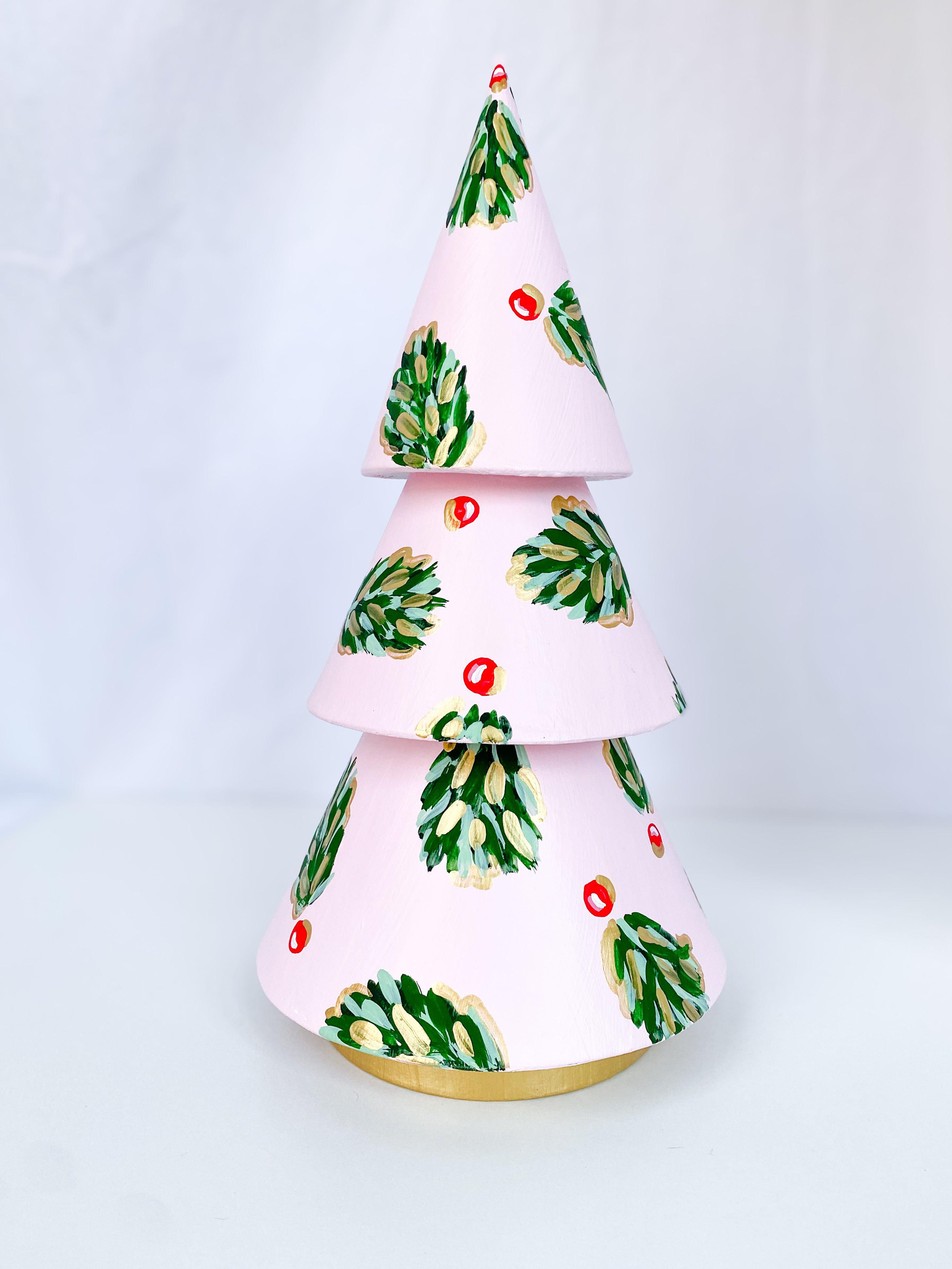 Frosty Pink Golden Holly Mini Tree - Tall-Hand-Painted Mini Christmas Tree | Measures 12" tall and approx. 6" wide | Features the Golden Holly design with a pale pink base and shimmery gold accents and gold trunk | Light-weight and non-breakable paper mache tree | Coated with a protective matte finish that will keep it shimmering year after year | Each tree is slightly different with potential small imperfections due to the hand-painted nature, making each one special and unique!-The Singing Little Bird