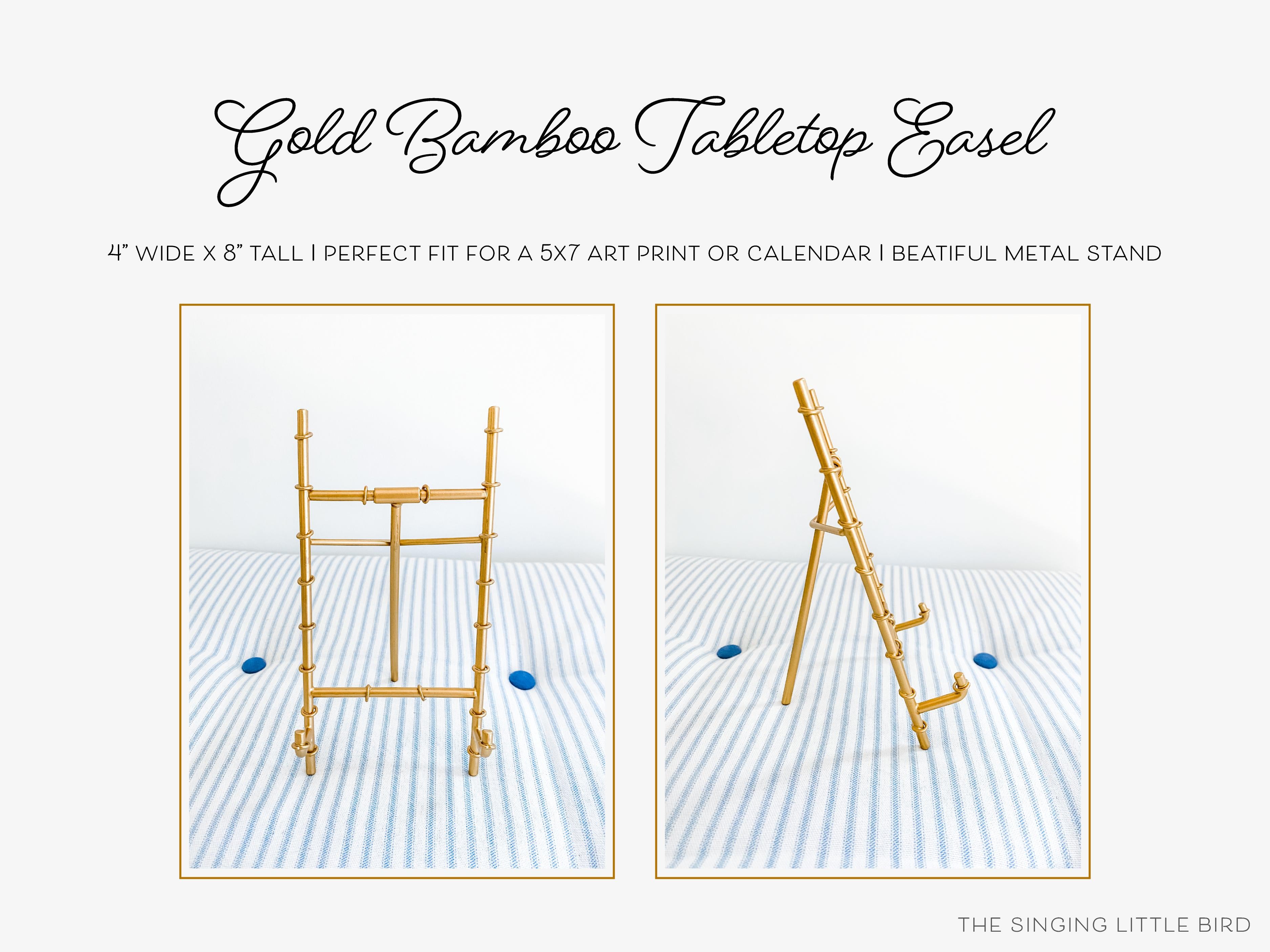 Gold Bamboo Easel-• Gold Metal Bamboo Easel
• Makes for a great display stand for calendars and 5x7 Art Prints
• Measures 4" wide x 8" tall-The Singing Little Bird