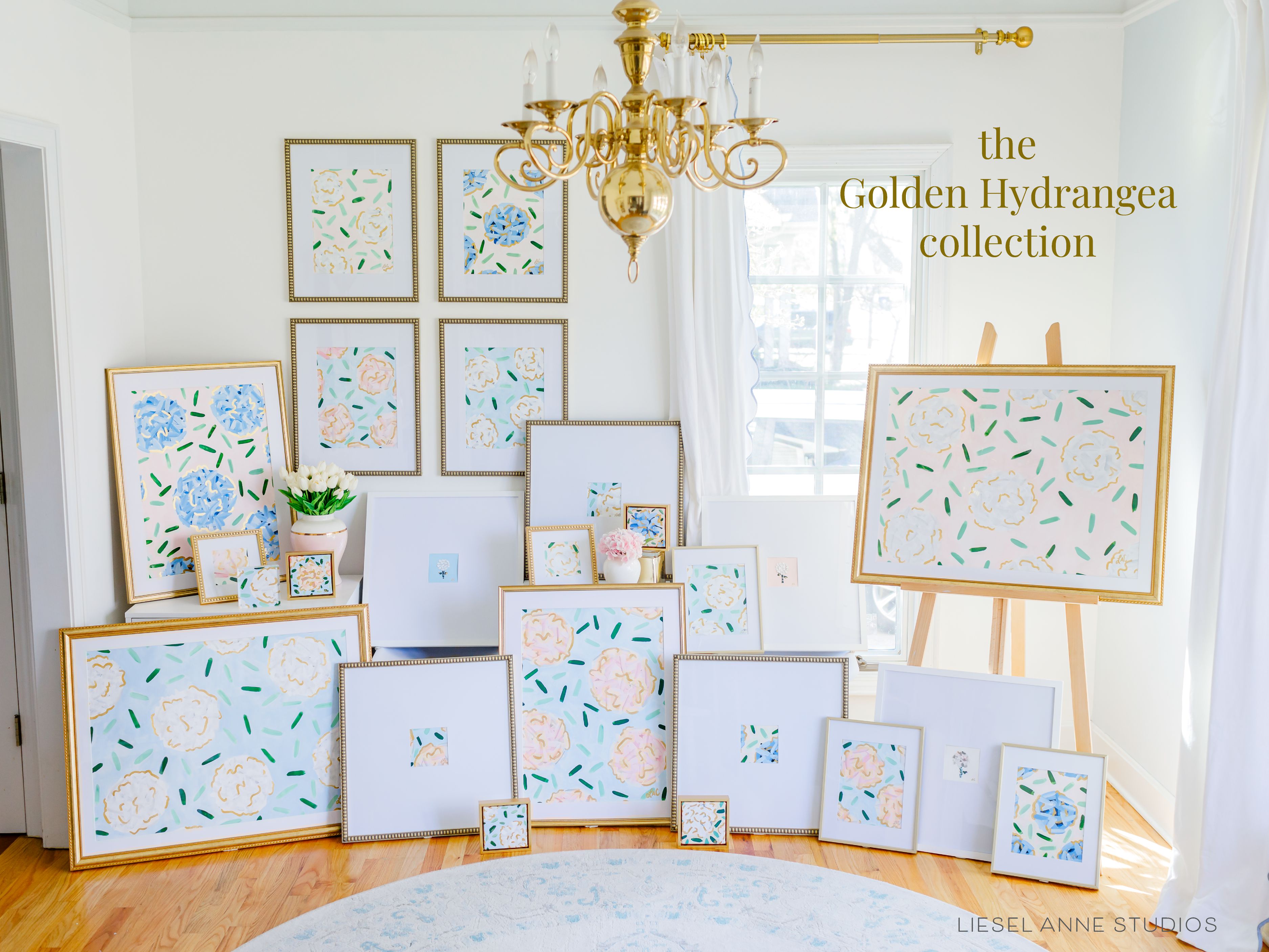 Golden Hydrangea | Blush & Blue VII-Original artwork measures 11"x14" | Hand-Painted with gouache on cold press watercolor paper | Matted and framed in gold wood frame sized 16"x20" | Glare-resistant glass | Hanging hardware included | Features our signature Golden Hydrangea design with a pale pink base, blue hydrangeas and shimmery gold accents | Initialed in gold by the Liesel Anne (the artist) on the front and signed and dated on the back.-The Singing Little Bird