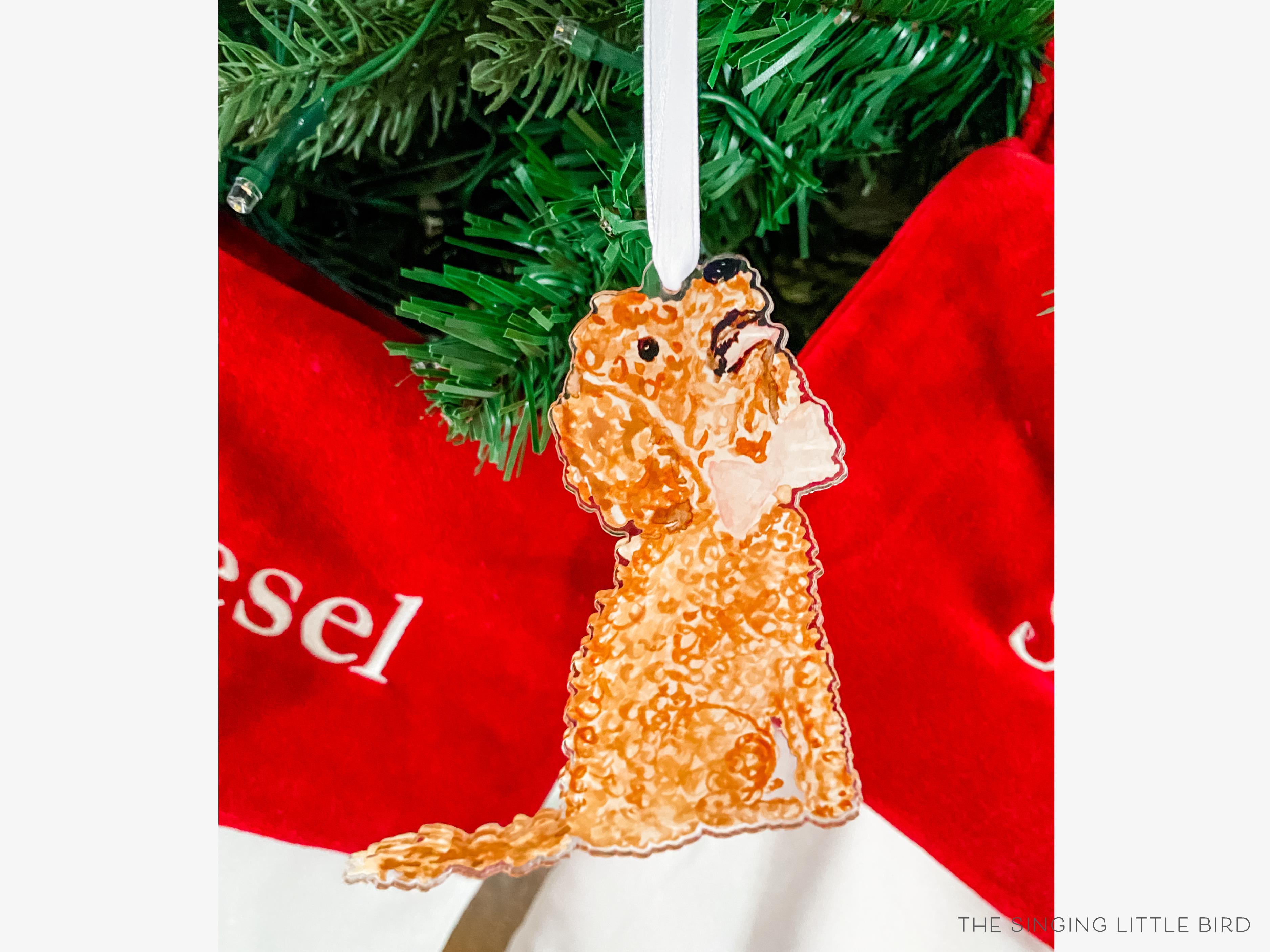 Goldendoodle Acrylic Ornament-These acrylic ornaments feature our hand-painted watercolor Goldendoodle. They include a white silk ribbon and measure approximately 4" on its longest side, making a great addition to your Christmas tree or gift for the animal lover in your life.-The Singing Little Bird