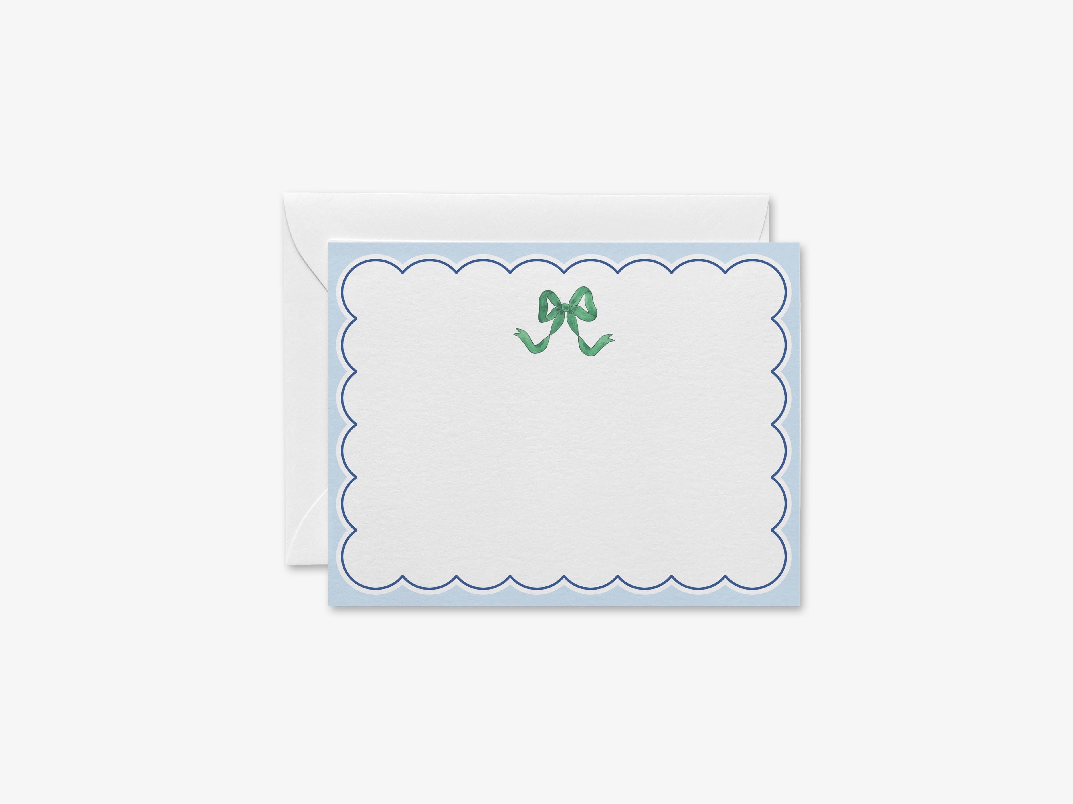 Green and Blue Scalloped Golden Bow Flat Notes [Sets of 8]-These flat notecards are 4.25x5.5 and feature our hand-painted watercolor green bow, and on the back of this stationery features our signature golden bow design on a navy base with whimsical green bows and white confetti, printed in the USA on 120lb textured stock. They come with white envelopes and make great thank yous and gifts for the bow lover in your life.-The Singing Little Bird