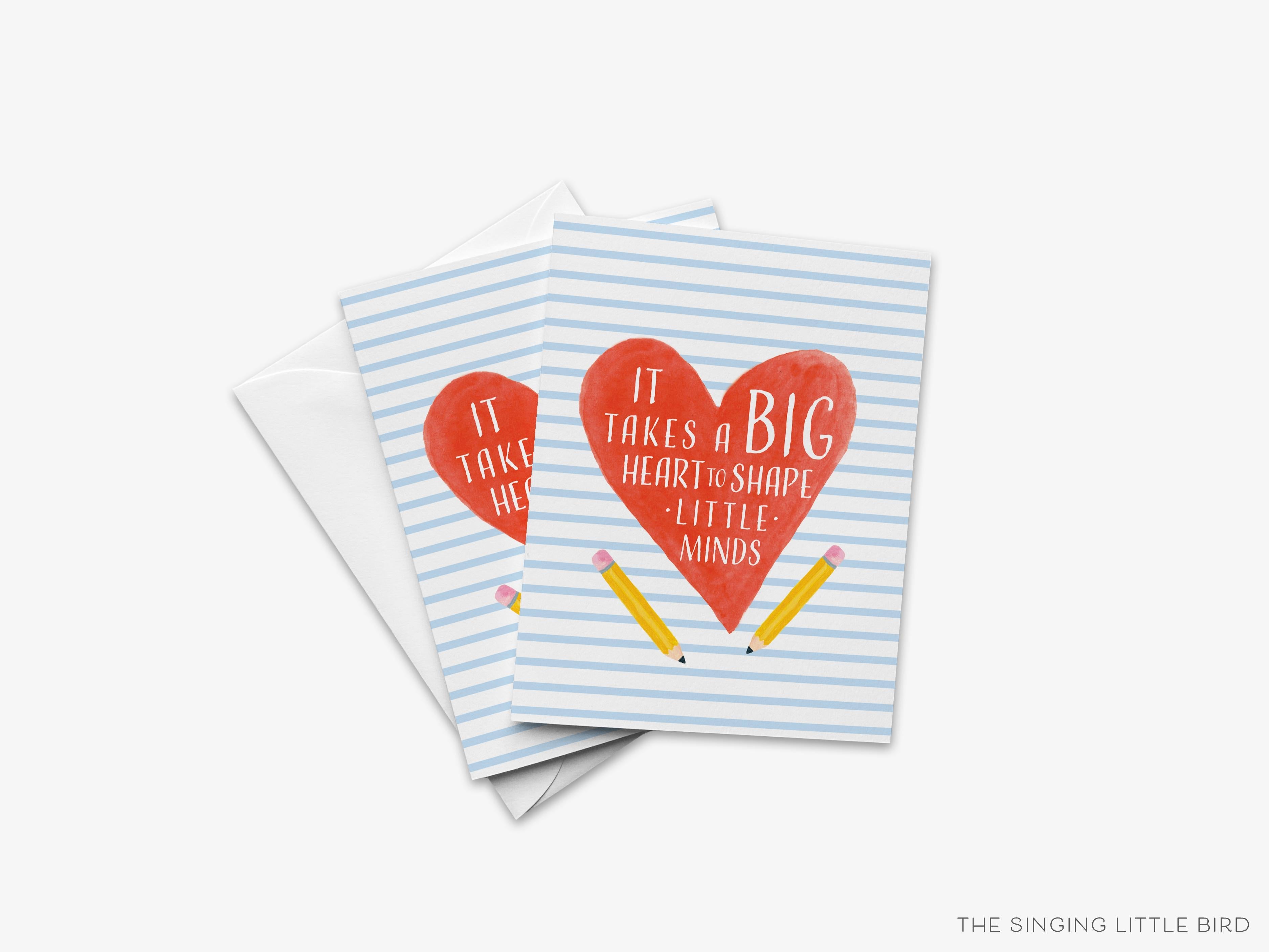 It Takes A Big Heart To Shape Little Minds Card-These folded greeting cards are 4.25x5.5 and feature our hand-painted heart and pencils, printed in the USA on 100lb textured stock. They come with a White envelope and make a great thank you card for the teacher who helped you in your life.-The Singing Little Bird