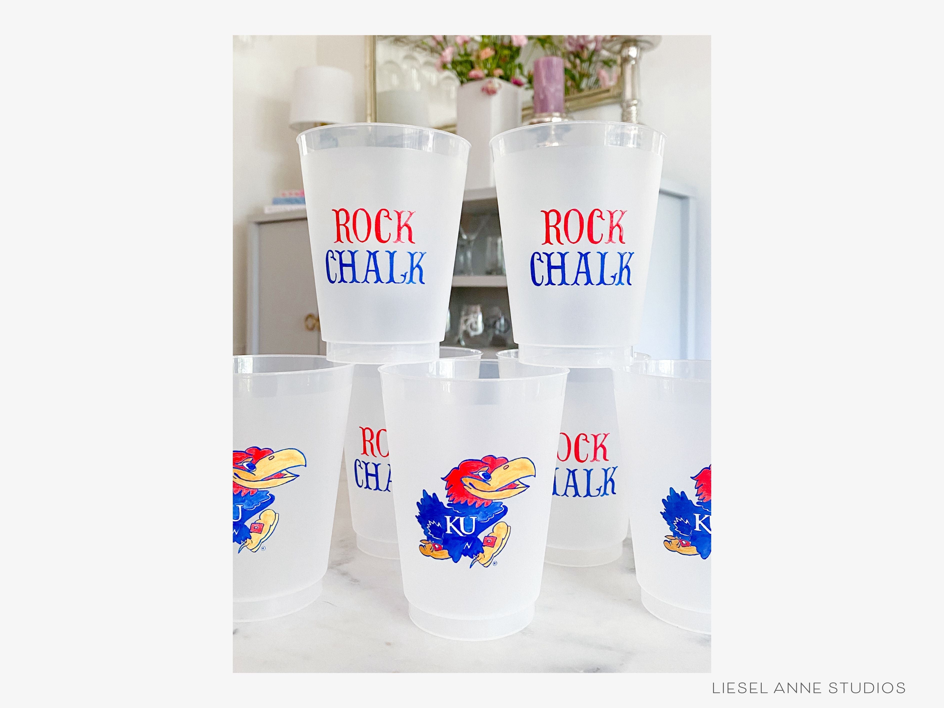 Jayhawk *Officially Licensed* 16oz Shatterproof Cups (Set of 8)-These officially licensed Kansas Jayhawk shatterproof cups feature our hand-painted Jayhawk and Rock Chalk text and make great party decorations for watch parties, graduation, game days and more! They come in sets of 8 and are re-usable for other parties to come or make wonderful party favors!-The Singing Little Bird