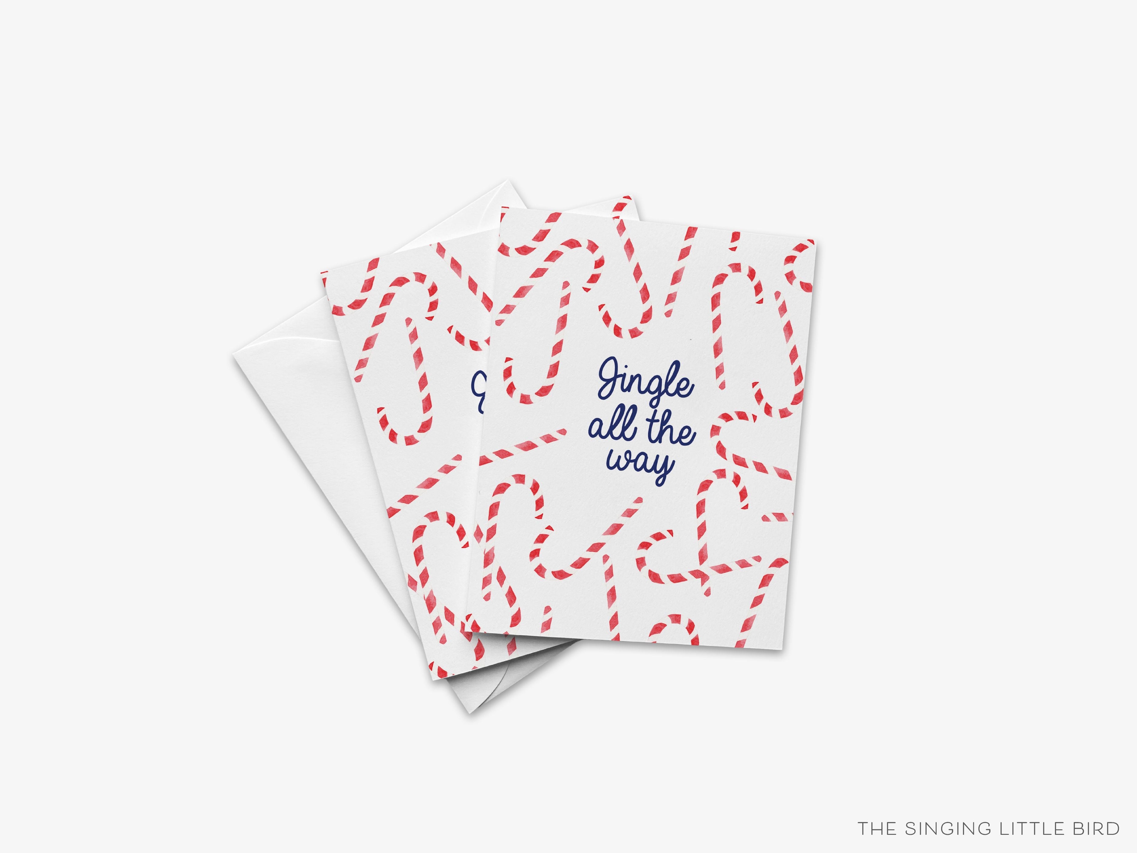 Jingle All The Way Christmas Card-These folded greeting cards are 4.25x5.5 and feature our hand-painted candy canes, printed in the USA on 100lb textured stock. They come with a White envelope and make a great Christmas card for the peppermint lover in your life.-The Singing Little Bird