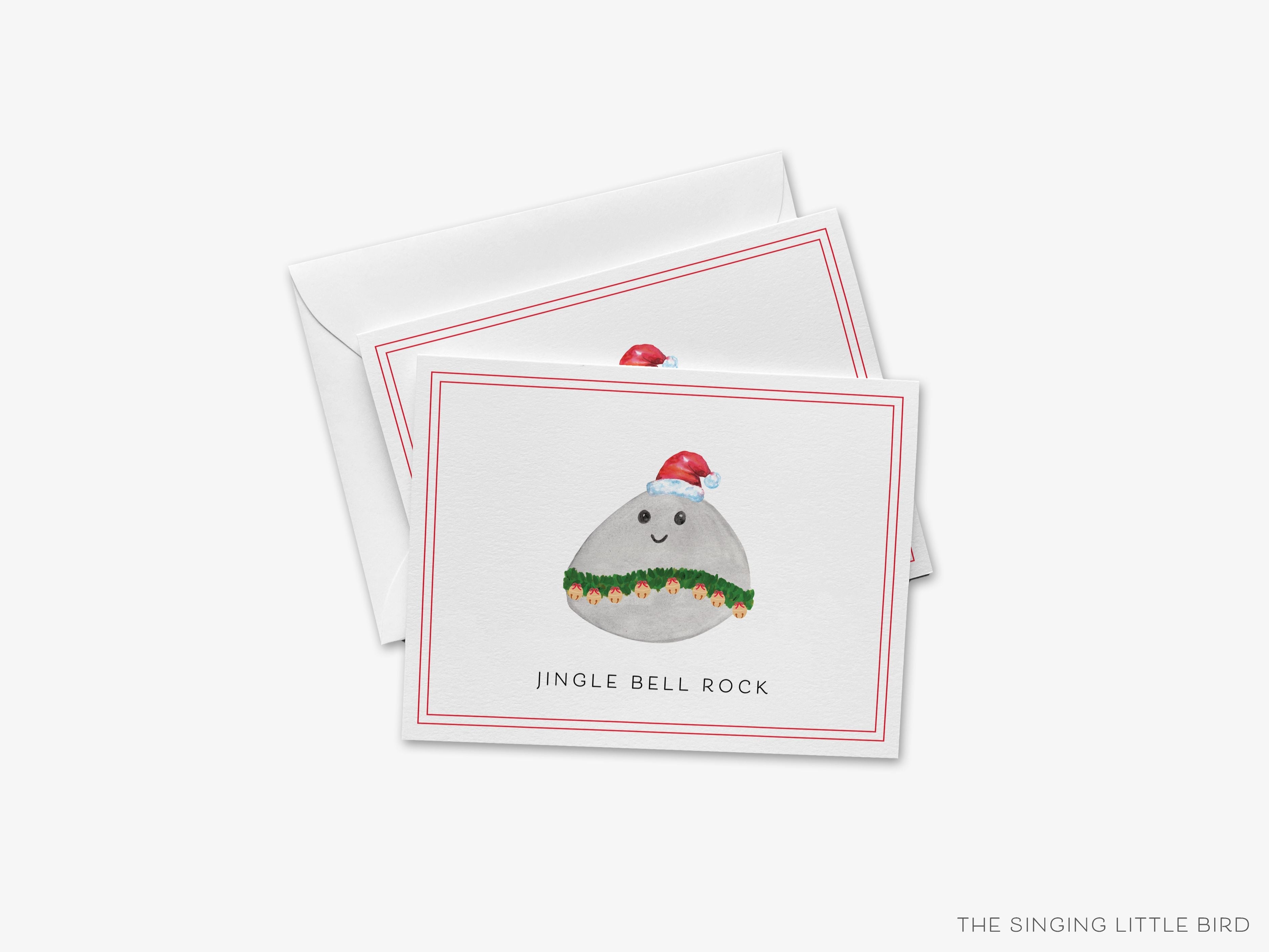 Jingle Bell Rock Christmas Card-These folded greeting cards are 4.25x5.5 and feature our hand-painted rock with Santa hat, printed in the USA on 100lb textured stock. They come with a White envelope and make a great happy holidays card for the holiday pun lover in your life.-The Singing Little Bird