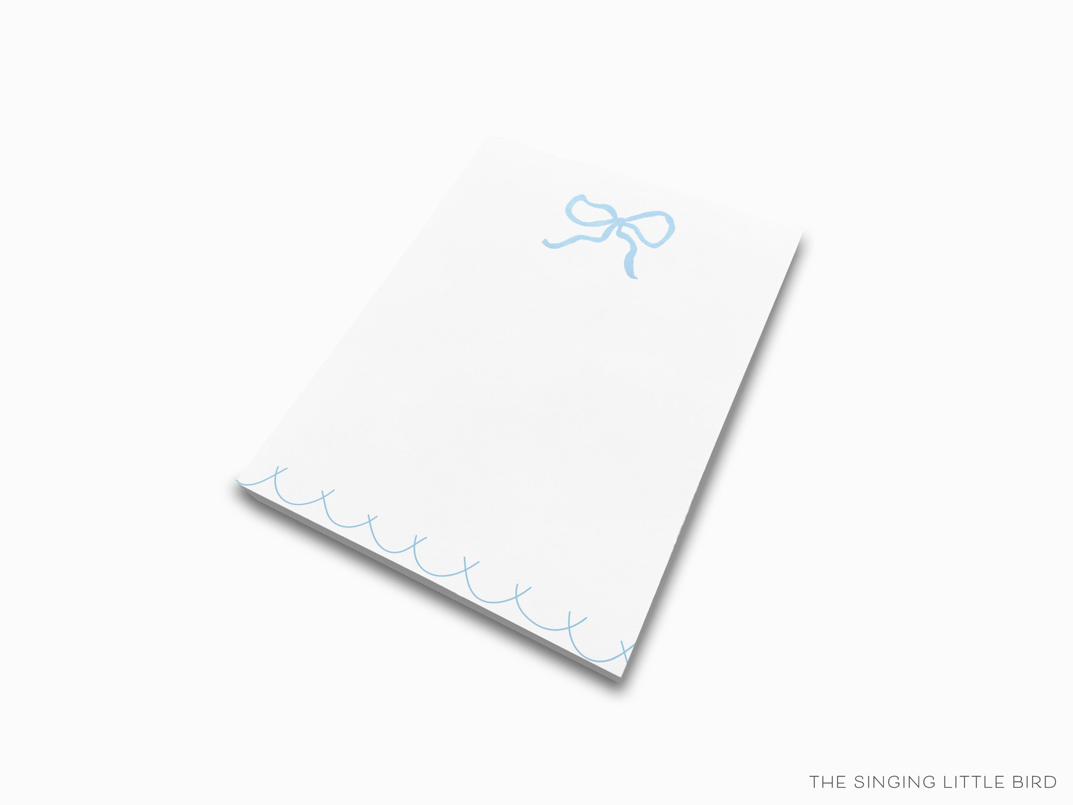 Light Blue Bow Notepad-These notepads feature our hand-painted watercolor bow, printed in the USA on a beautiful smooth stock. You choose which size you want (or bundled together for a beautiful gift set) and makes a great gift for the checklist and feminine bow lover in your life.-The Singing Little Bird