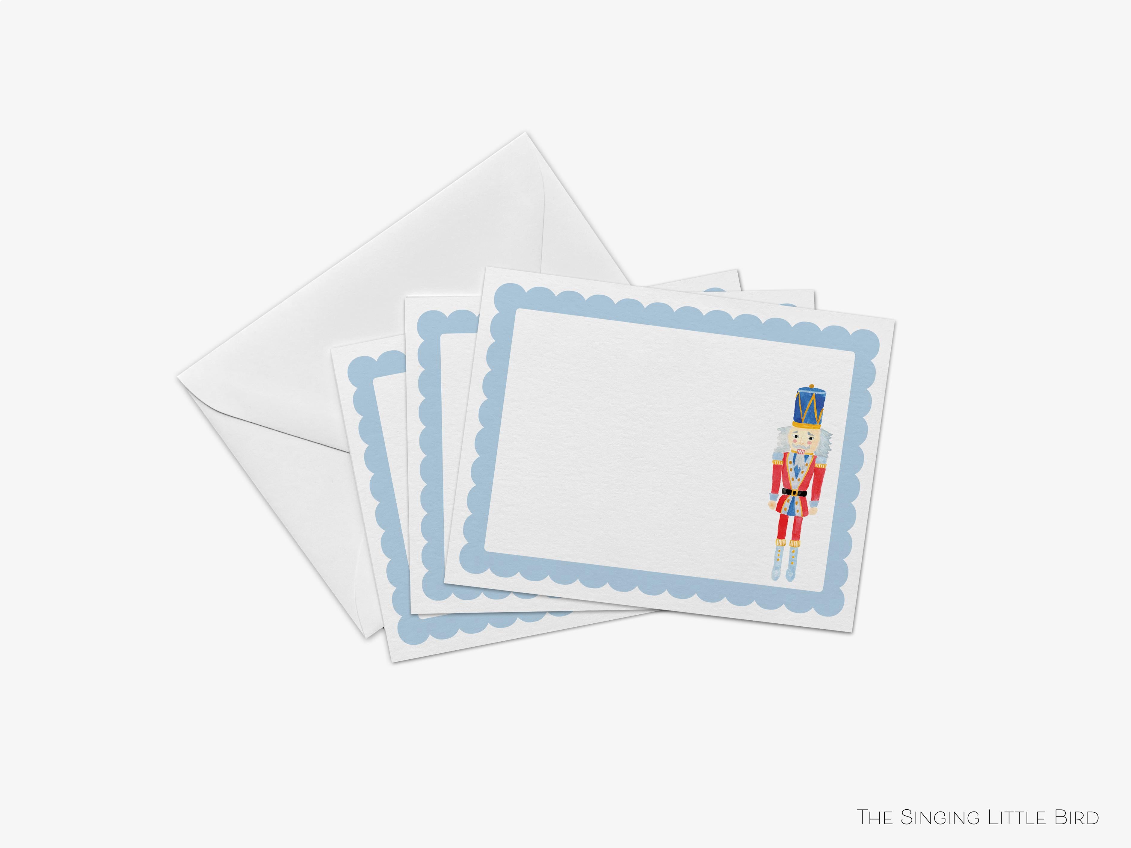 Nutcracker Holiday Flat Notes [Sets of 8]-These flat notecards are 4.25x5.5 and feature our hand-painted watercolor nutcracker, printed in the USA on 120lb textured stock. They come with white envelopes and make great thank yous and gifts for the holiday lover in your life.-The Singing Little Bird
