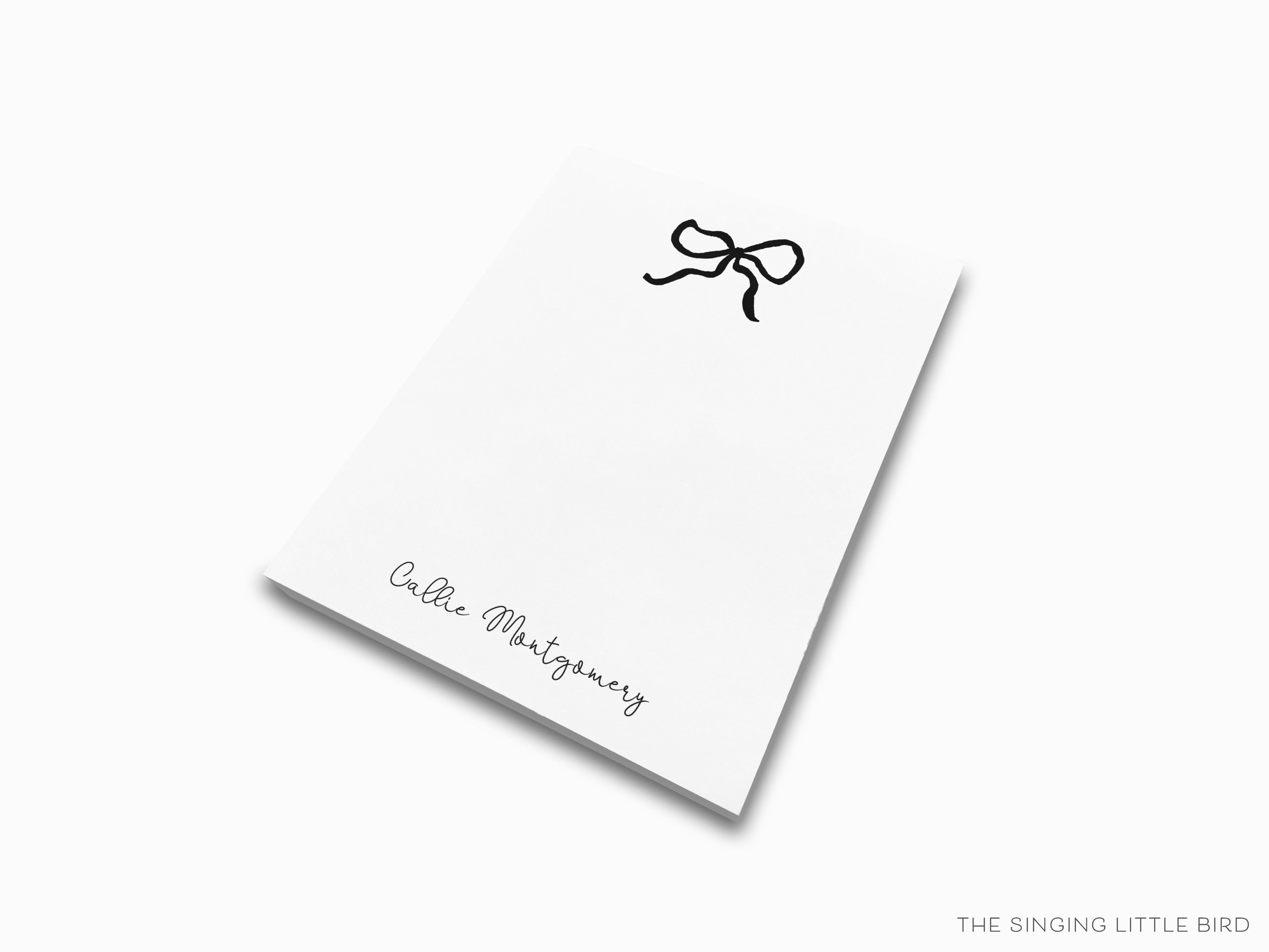 Personalized Black Bow Notepad-These personalized notepads feature our hand-painted watercolor bow, printed in the USA on a beautiful smooth stock. You choose which size you want (or bundled together for a beautiful gift set) and makes a great gift for the checklist and feminine bow lover in your life.-The Singing Little Bird