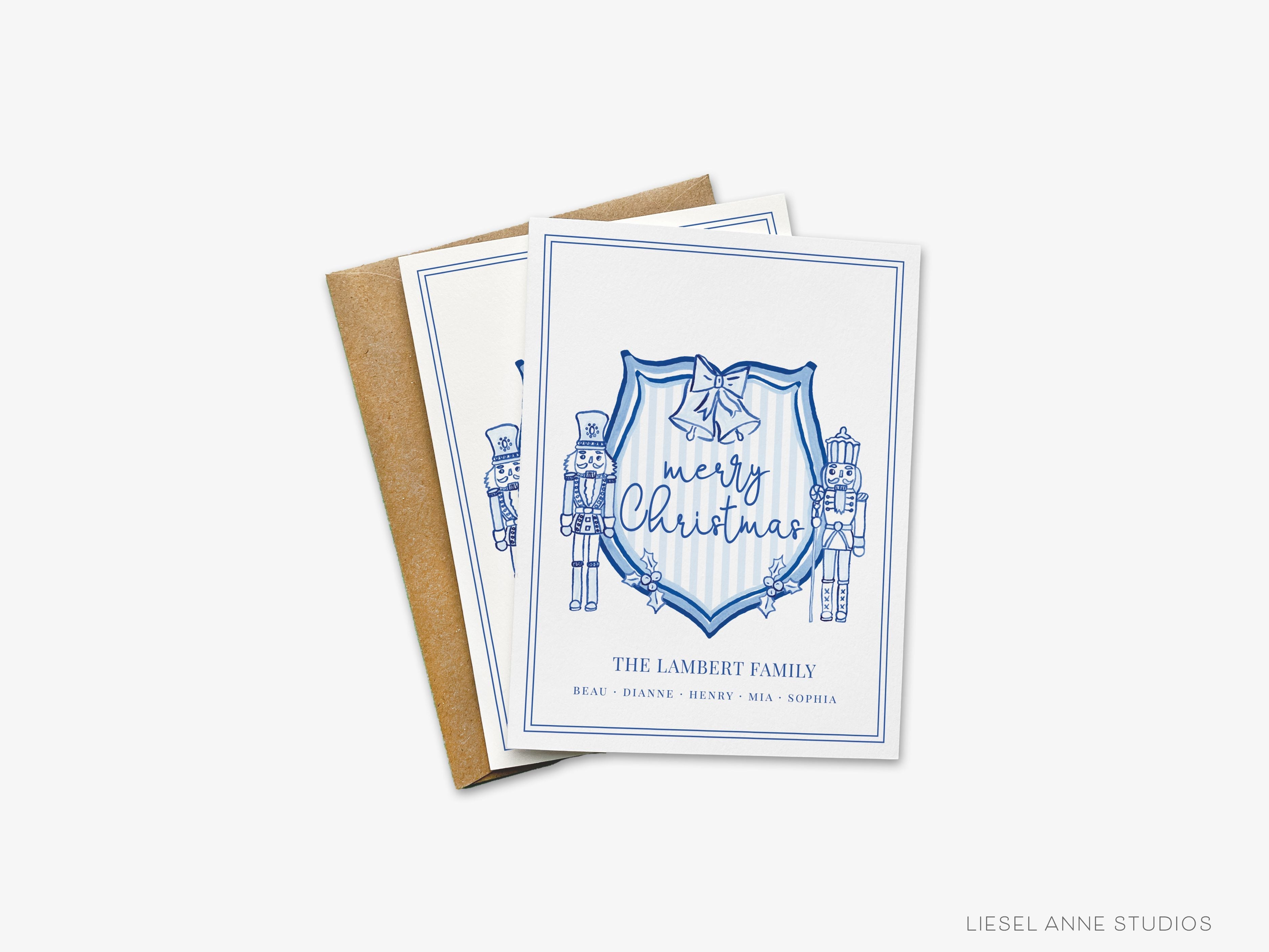 Personalized Christmas Crest Blue and White Cards-These folded greeting cards are 4.25x5.5 and feature our hand-painted Nutcracker Crest, printed in the USA on 100lb textured stock. They come with a White or Kraft envelope and make a great just because card for the Christmas lover in your life.-The Singing Little Bird