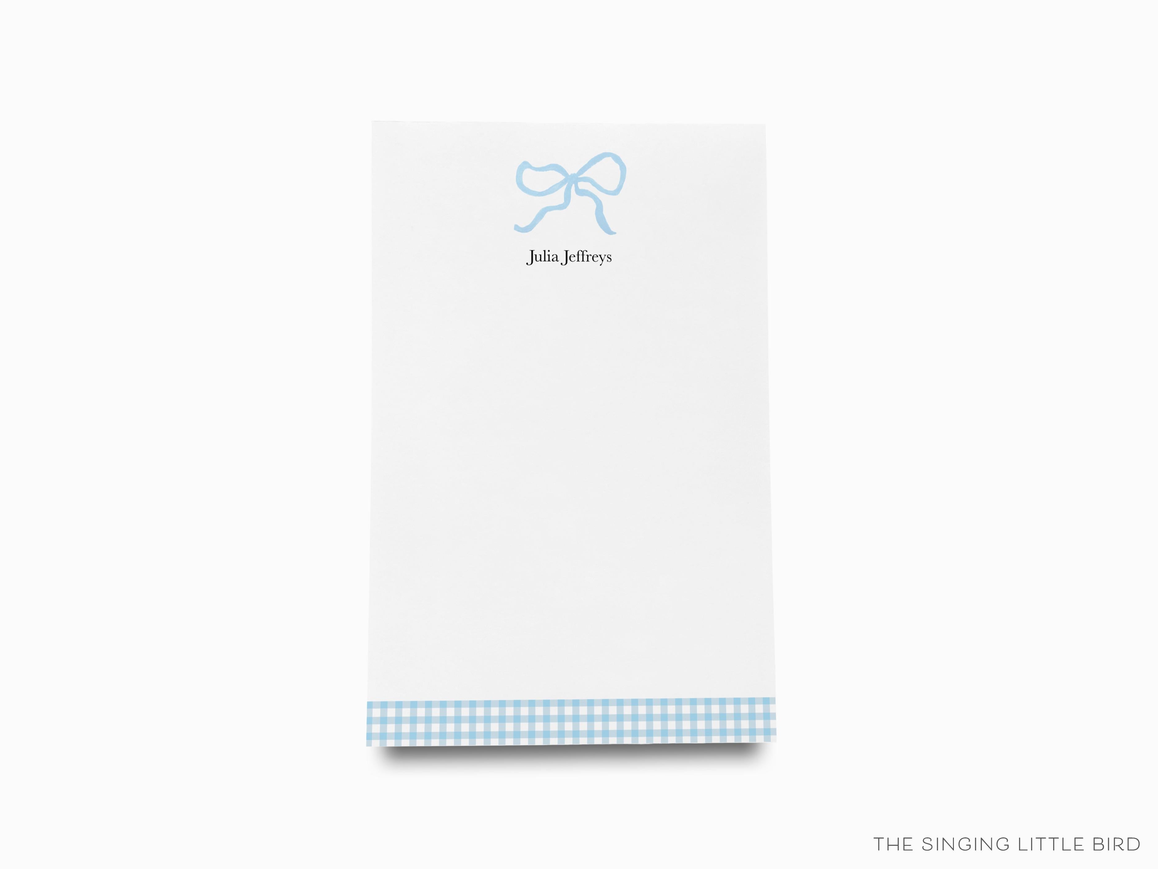 Personalized Light Blue Bow Notepad-These personalized notepads feature our hand-painted watercolor bow, printed in the USA on a beautiful smooth stock. You choose which size you want (or bundled together for a beautiful gift set) and makes a great gift for the checklist and feminine bow lover in your life.-The Singing Little Bird