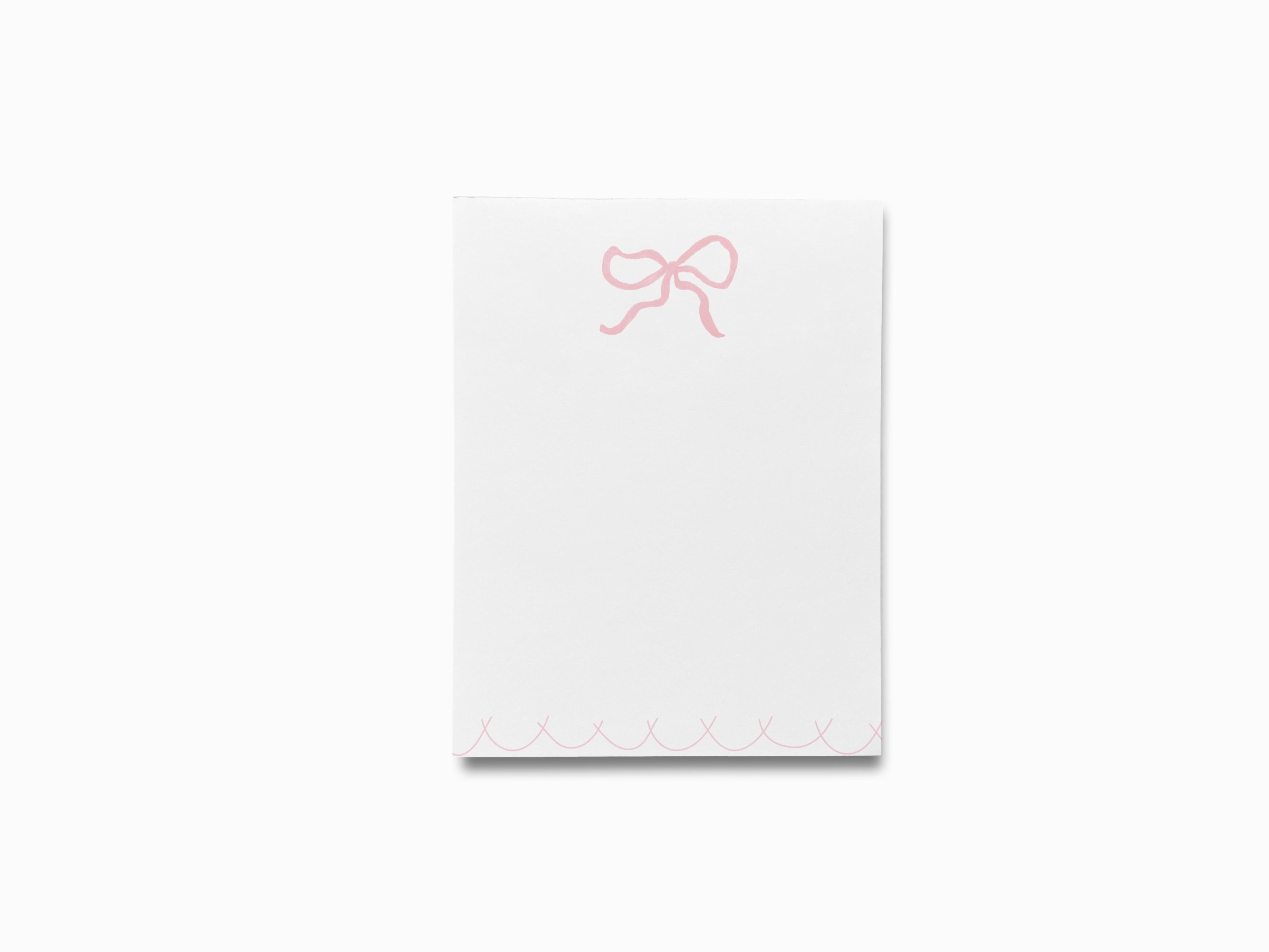 Pink Bow Notepad-These notepads feature our hand-painted watercolor bow, printed in the USA on a beautiful smooth stock. You choose which size you want (or bundled together for a beautiful gift set) and makes a great gift for the checklist and feminine bow lover in your life.-The Singing Little Bird