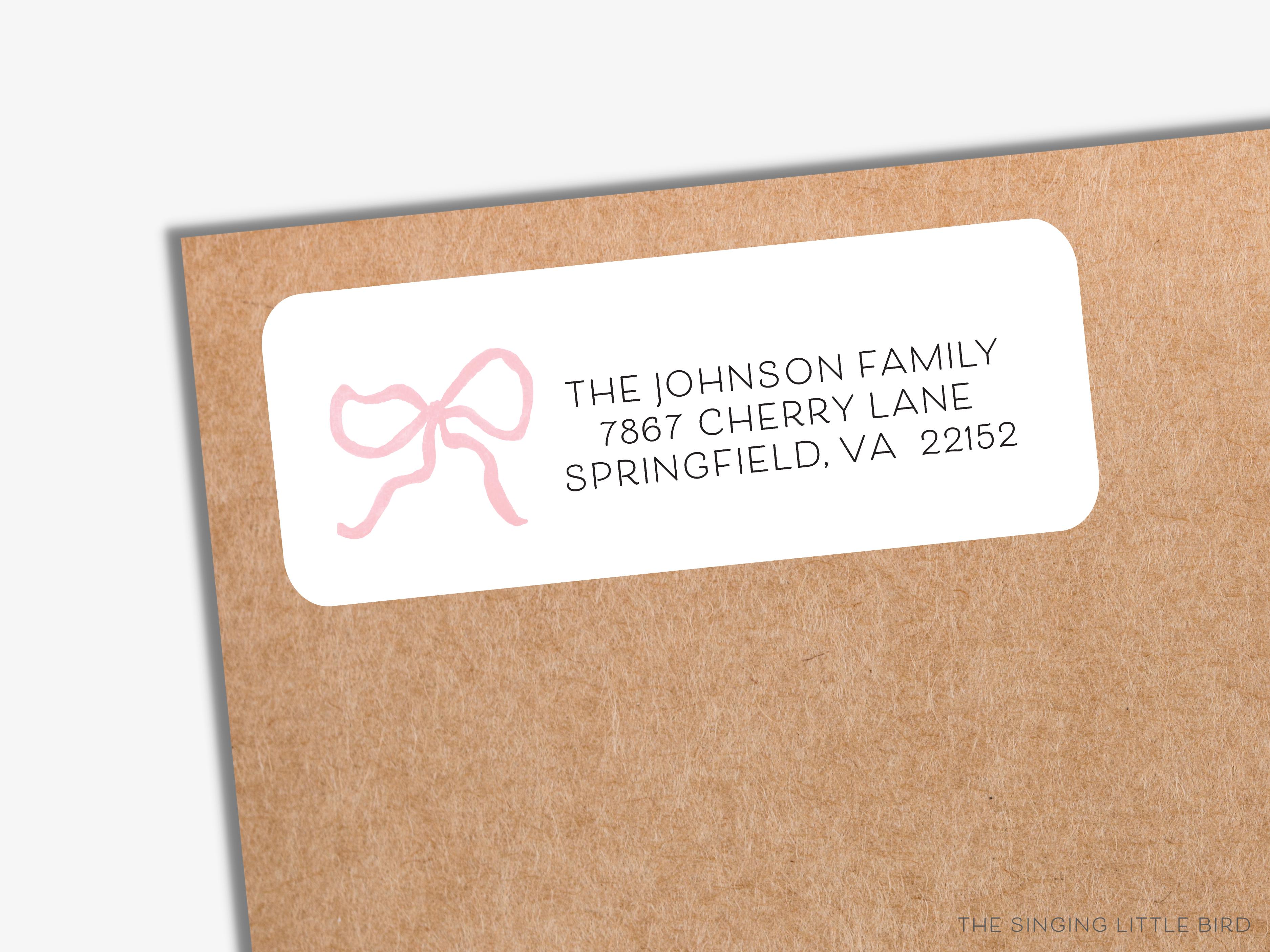 Pink Bow Return Address Labels-These personalized return address labels are 2.625" x 1" and feature our hand-painted watercolor bow, printed in the USA on beautiful matte finish labels. These make great gifts for yourself or the girly lover.-The Singing Little Bird
