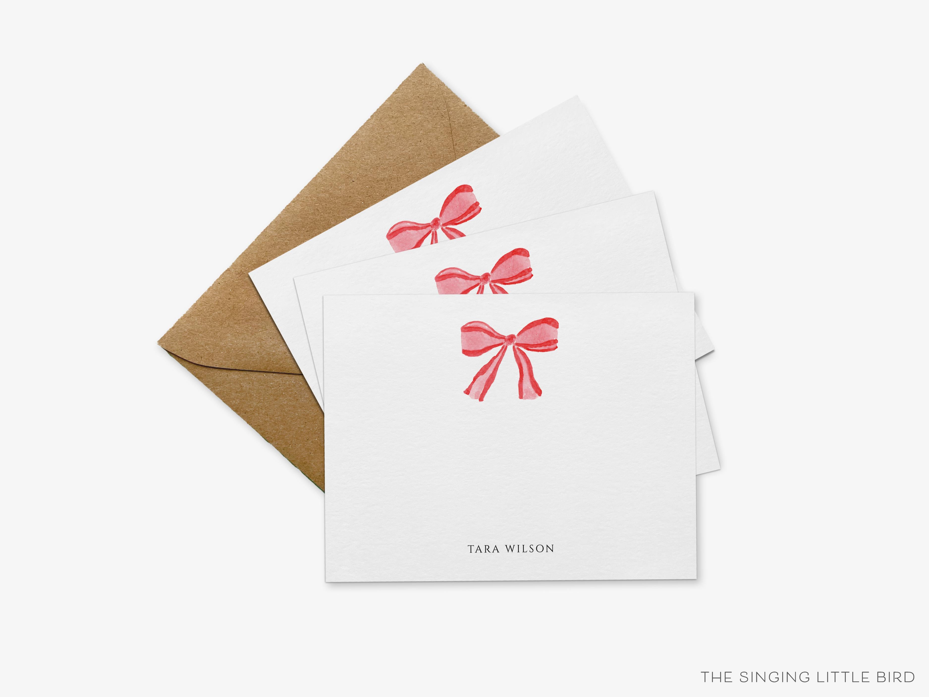 Red Bow Christmas Flat Notes-These personalized flat notecards are 4.25x5.5 and feature our hand-painted watercolor red bow, printed in the USA on 120lb textured stock. They come with your choice of envelopes and make great thank yous and gifts for the Christmas bow lover in your life.-The Singing Little Bird