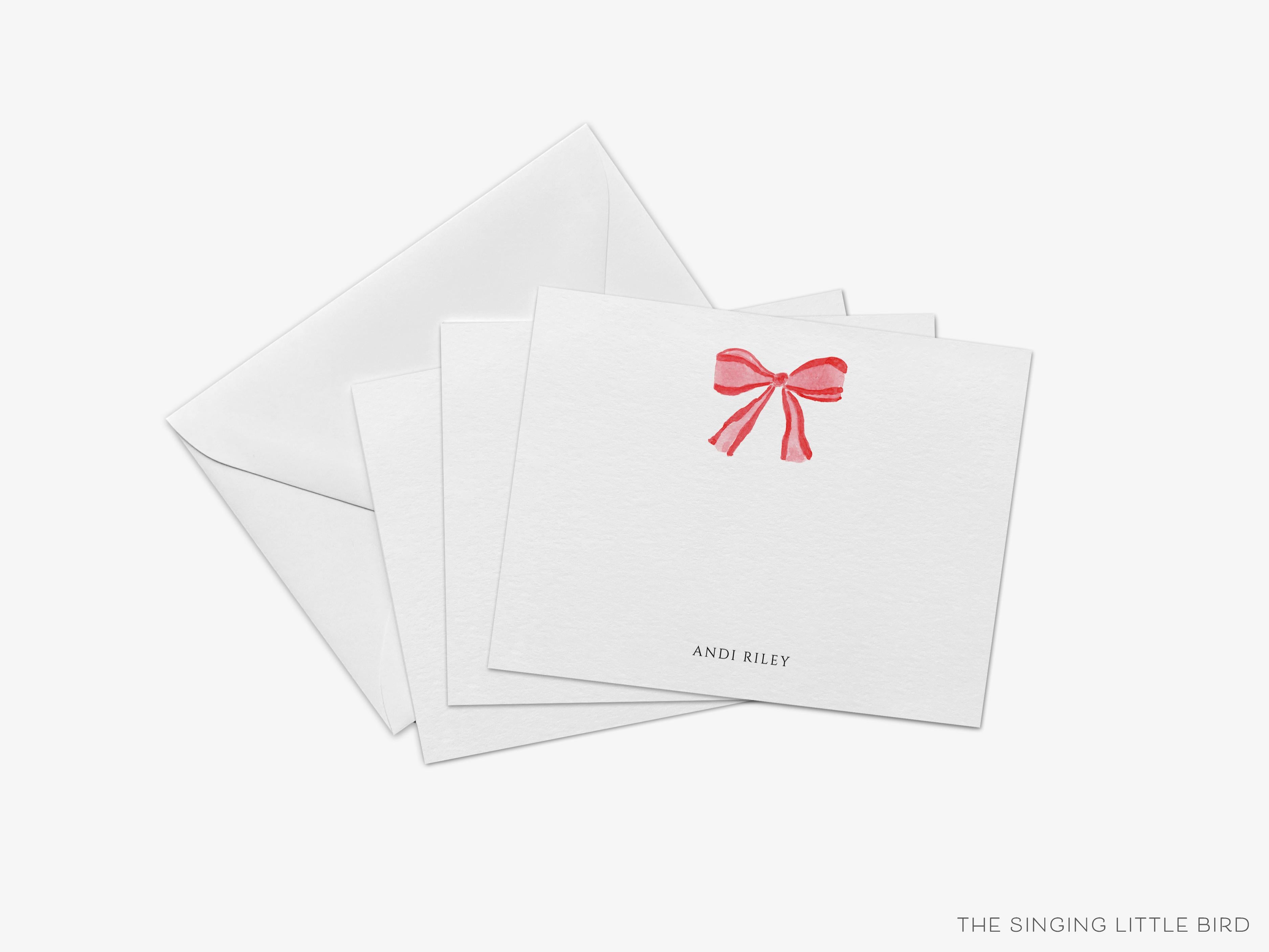 Red Bow Christmas Flat Notes-These personalized flat notecards are 4.25x5.5 and feature our hand-painted watercolor red bow, printed in the USA on 120lb textured stock. They come with your choice of envelopes and make great thank yous and gifts for the Christmas bow lover in your life.-The Singing Little Bird