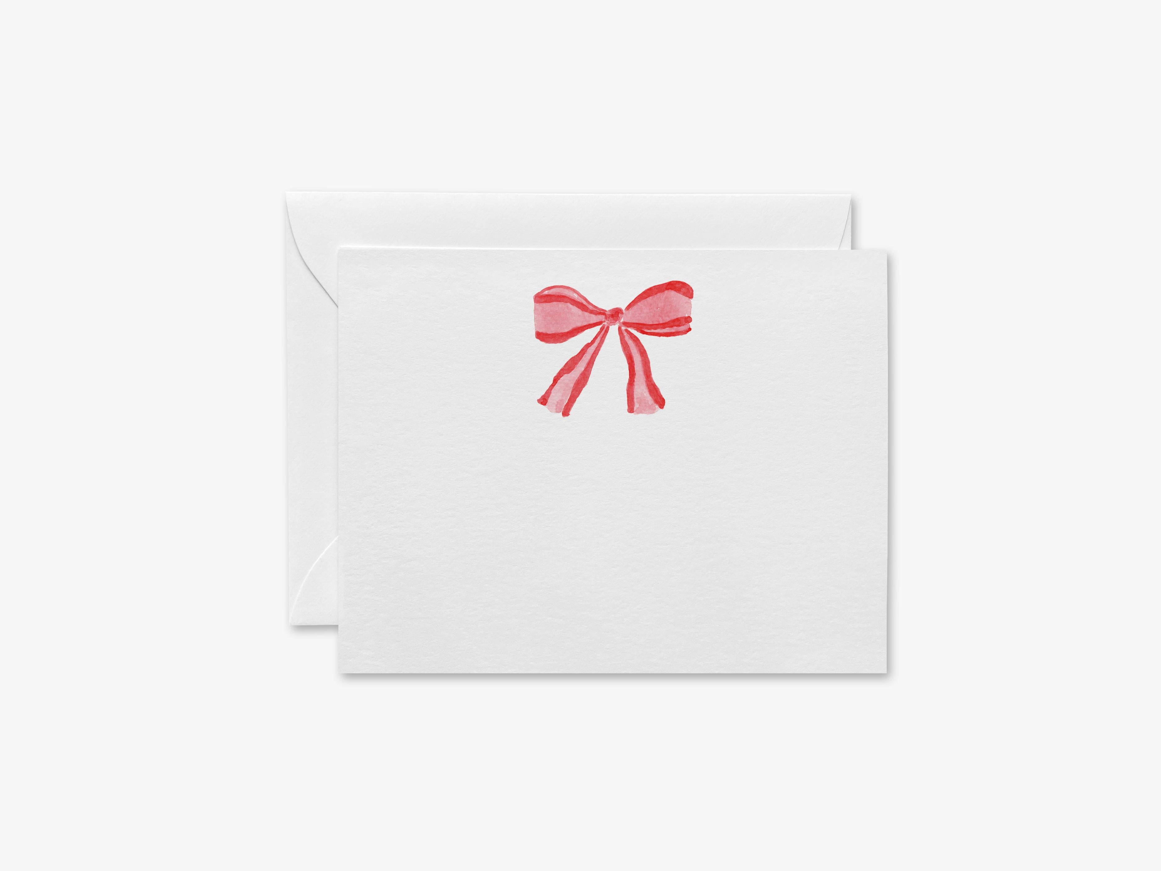 Red Bow Christmas Flat Notes-These personalized flat notecards are 4.25x5.5 and feature our hand-painted watercolor red bow, printed in the USA on 120lb textured stock. They come with your choice of envelopes and make great thank yous and gifts for the Christmas bow lover in your life.-The Singing Little Bird