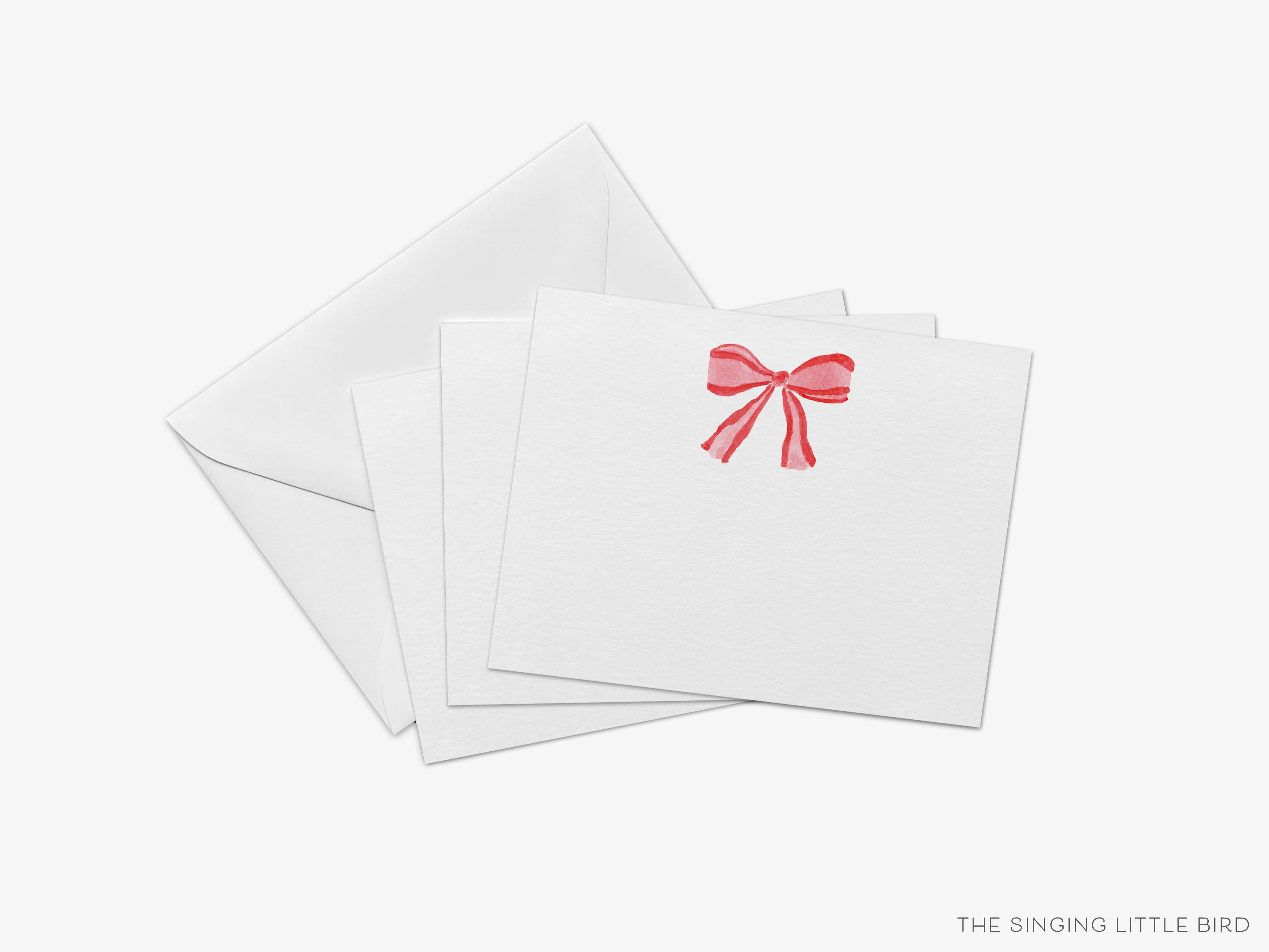 Red Bow Christmas Flat Notes-These personalized flat notecards are 4.25x5.5 and feature our hand-painted watercolor red bow, printed in the USA on 120lb textured stock. They come with your choice of envelopes and make great thank yous and gifts for the Christmas bow lover in your life.-The Singing Little Bird