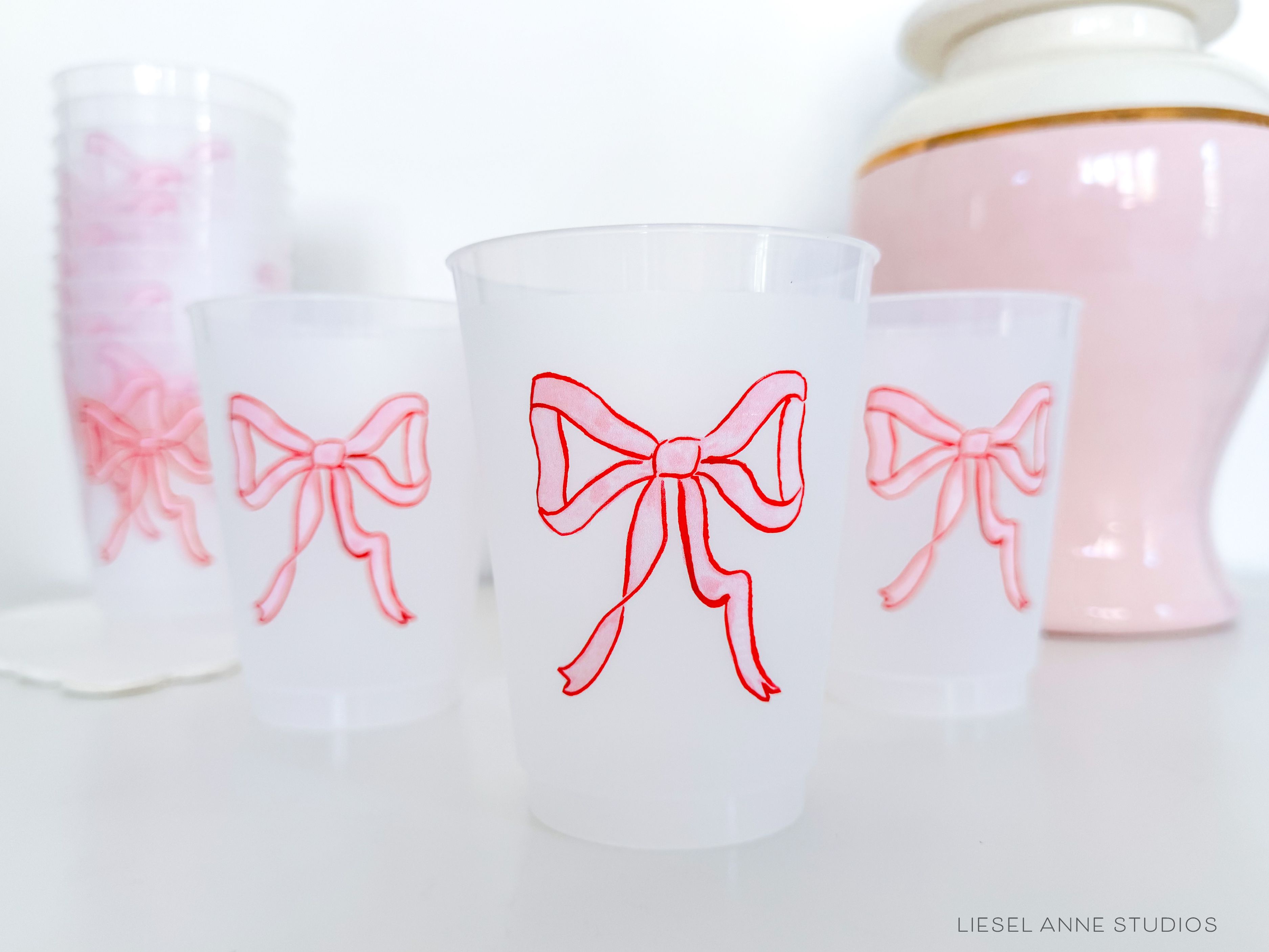 Red & Pink Holiday Bow 16oz Shatterproof Cups [Set of 8]-These shatterproof cups feature our hand-painted preppy red & pink bow and make great party decorations for your holiday gatherings, christmas and valentine's parties, galentine's festivities and more! They come in sets of 8 and are re-usable for other parties to come or make wonderful party favors!-The Singing Little Bird