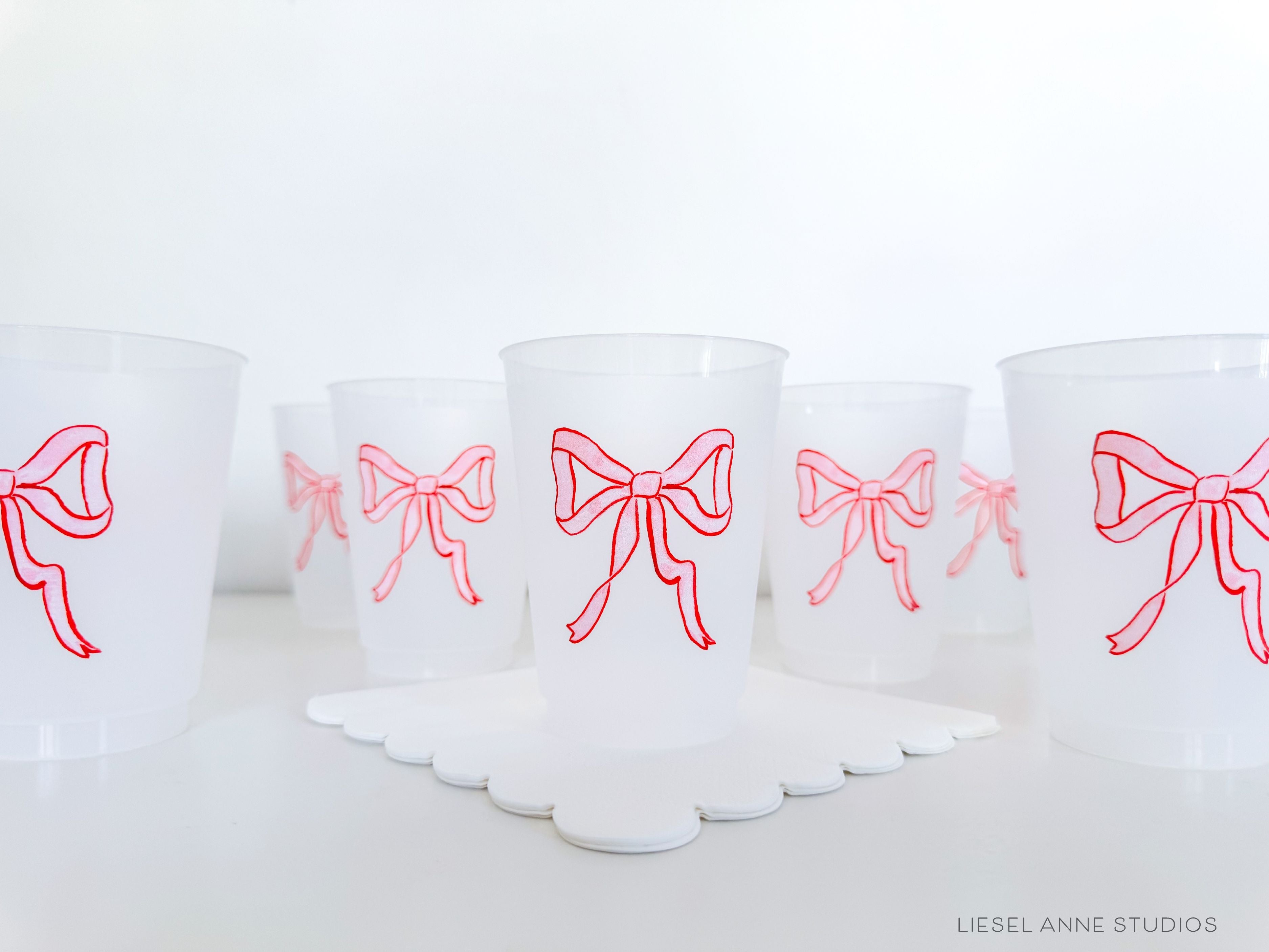 Red & Pink Holiday Bow 16oz Shatterproof Cups [Set of 8]-These shatterproof cups feature our hand-painted preppy red & pink bow and make great party decorations for your holiday gatherings, christmas and valentine's parties, galentine's festivities and more! They come in sets of 8 and are re-usable for other parties to come or make wonderful party favors!-The Singing Little Bird