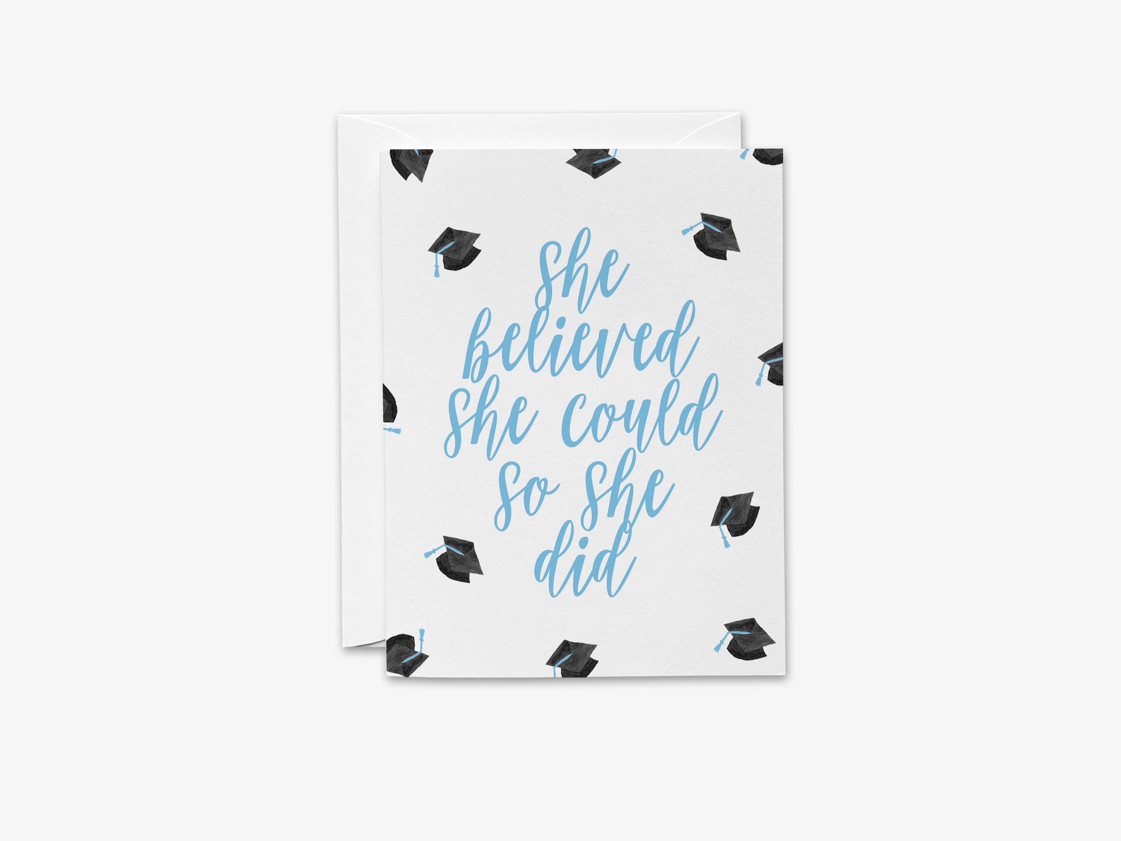 She Believed She Could So She Did Graduation Card - Blue-These folded greeting cards are 4.25x5.5 and feature our hand-painted graduation caps, printed in the USA on 100lb textured stock. They come with a White envelope and make a great congratulations card for the female graduate in your life.-The Singing Little Bird