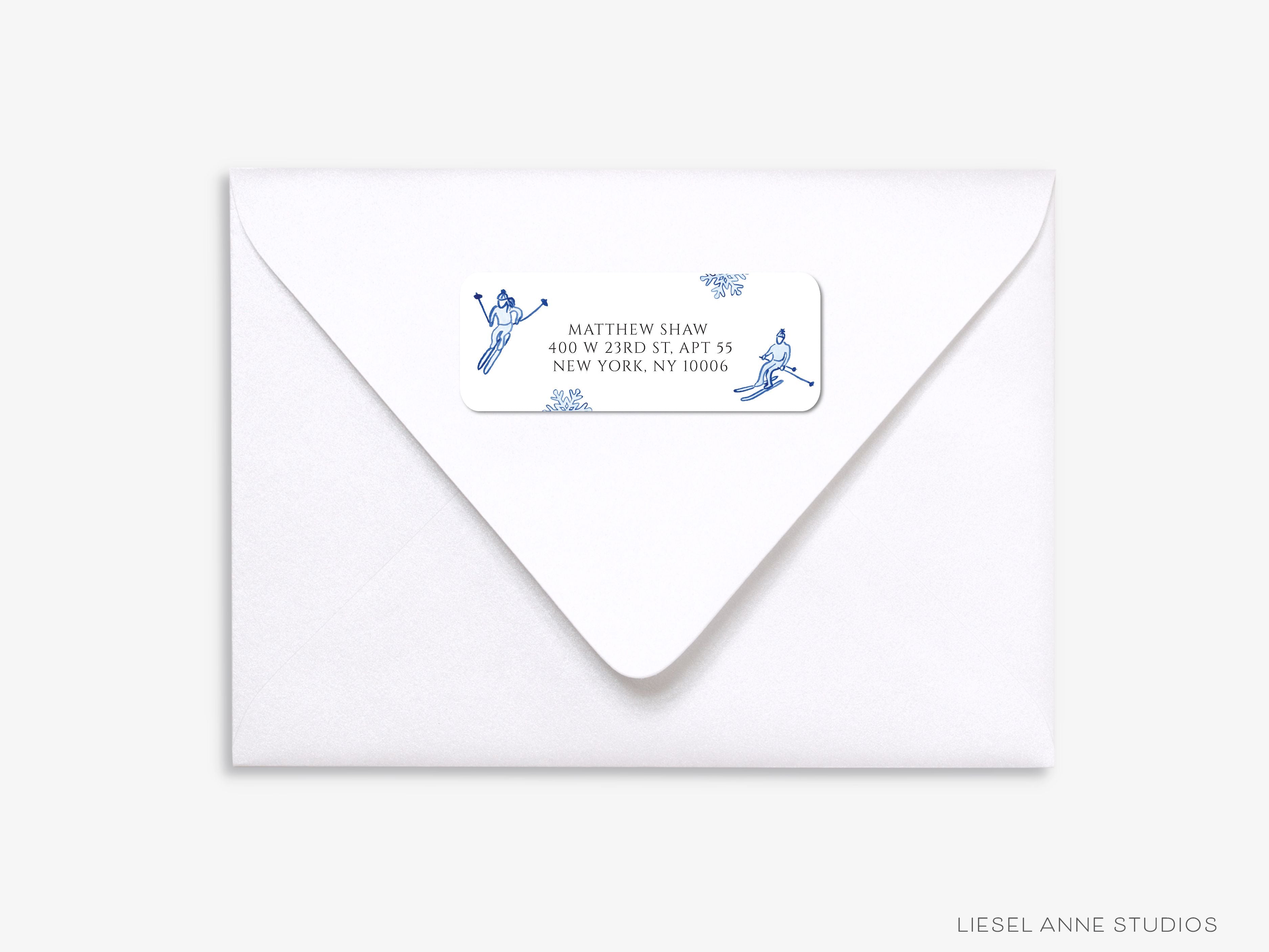 Skier Blue and White Return Address Labels-These personalized return address labels are 2.625" x 1" and feature our hand-painted watercolor blue skiers and snowflakes, printed in the USA on beautiful matte finish labels. These make great gifts for yourself or the ski slopes lover.-The Singing Little Bird