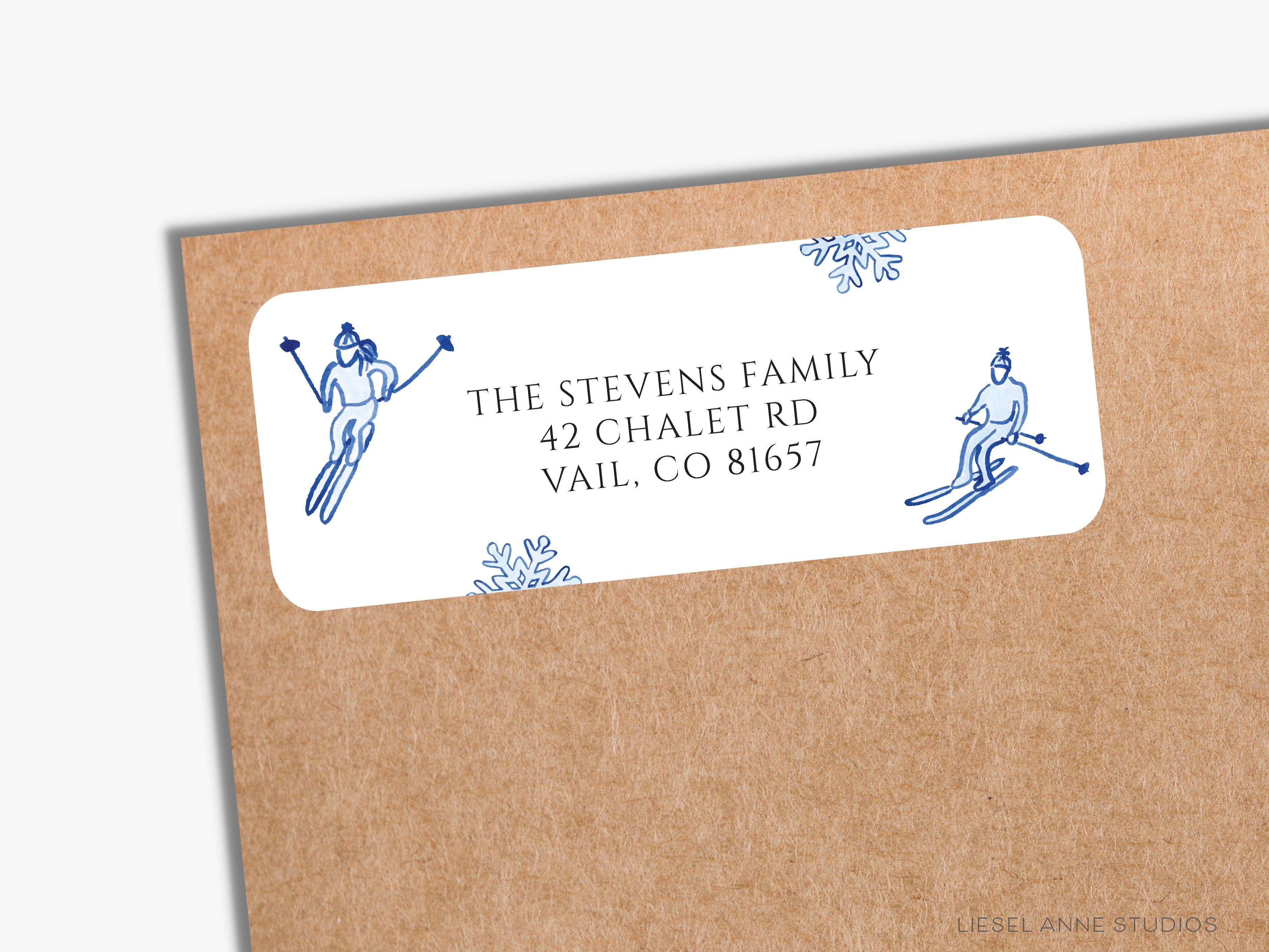 Skier Blue and White Return Address Labels-These personalized return address labels are 2.625" x 1" and feature our hand-painted watercolor blue skiers and snowflakes, printed in the USA on beautiful matte finish labels. These make great gifts for yourself or the ski slopes lover.-The Singing Little Bird