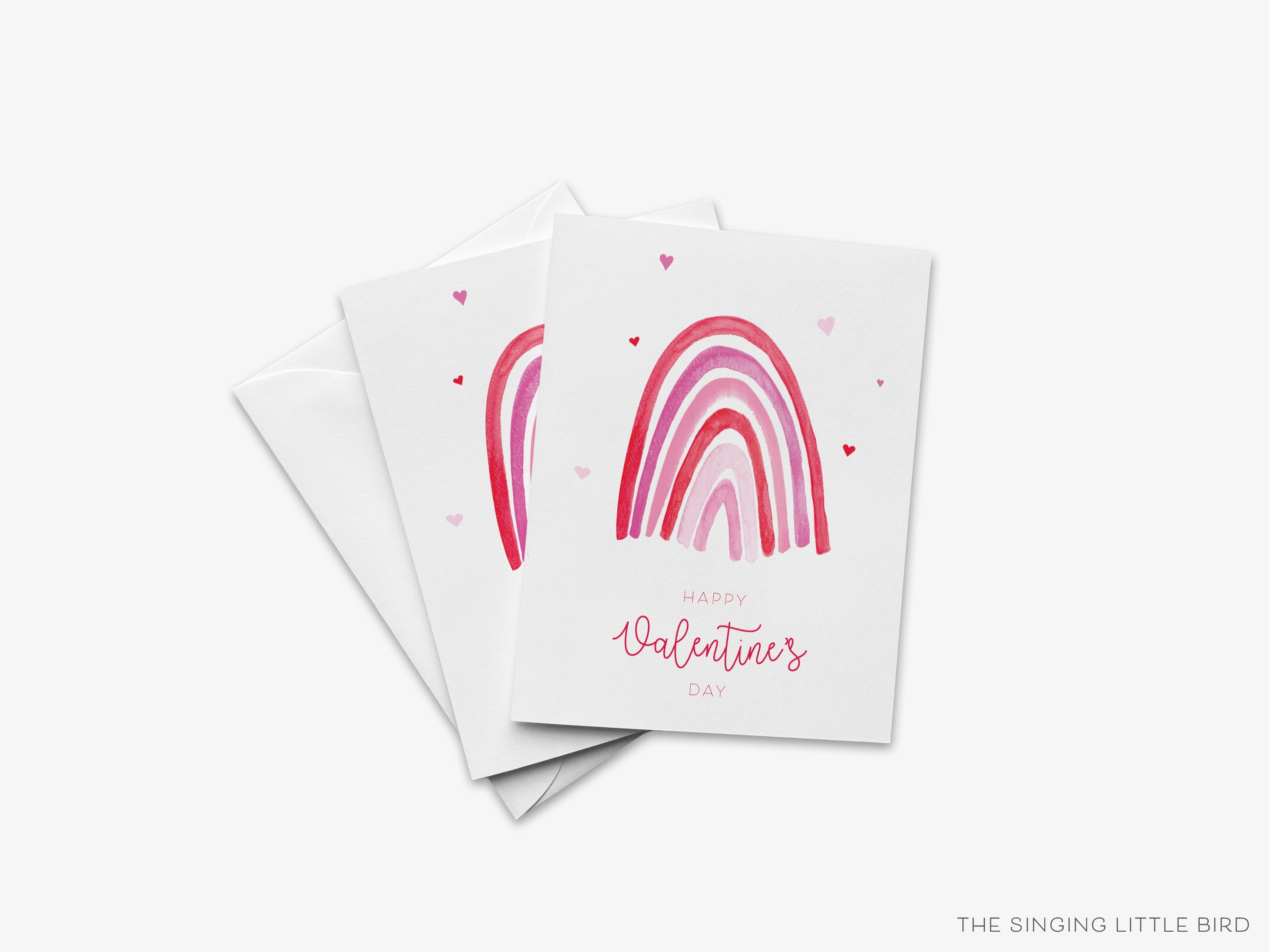 Valentine's Rainbow Greeting Card-These folded greeting cards are 4.25x5.5 and feature our hand-painted pink rainbow, printed in the USA on 100lb textured stock. They come with a White envelope and make a great Valentine's Day card for the special someone in your life.-The Singing Little Bird