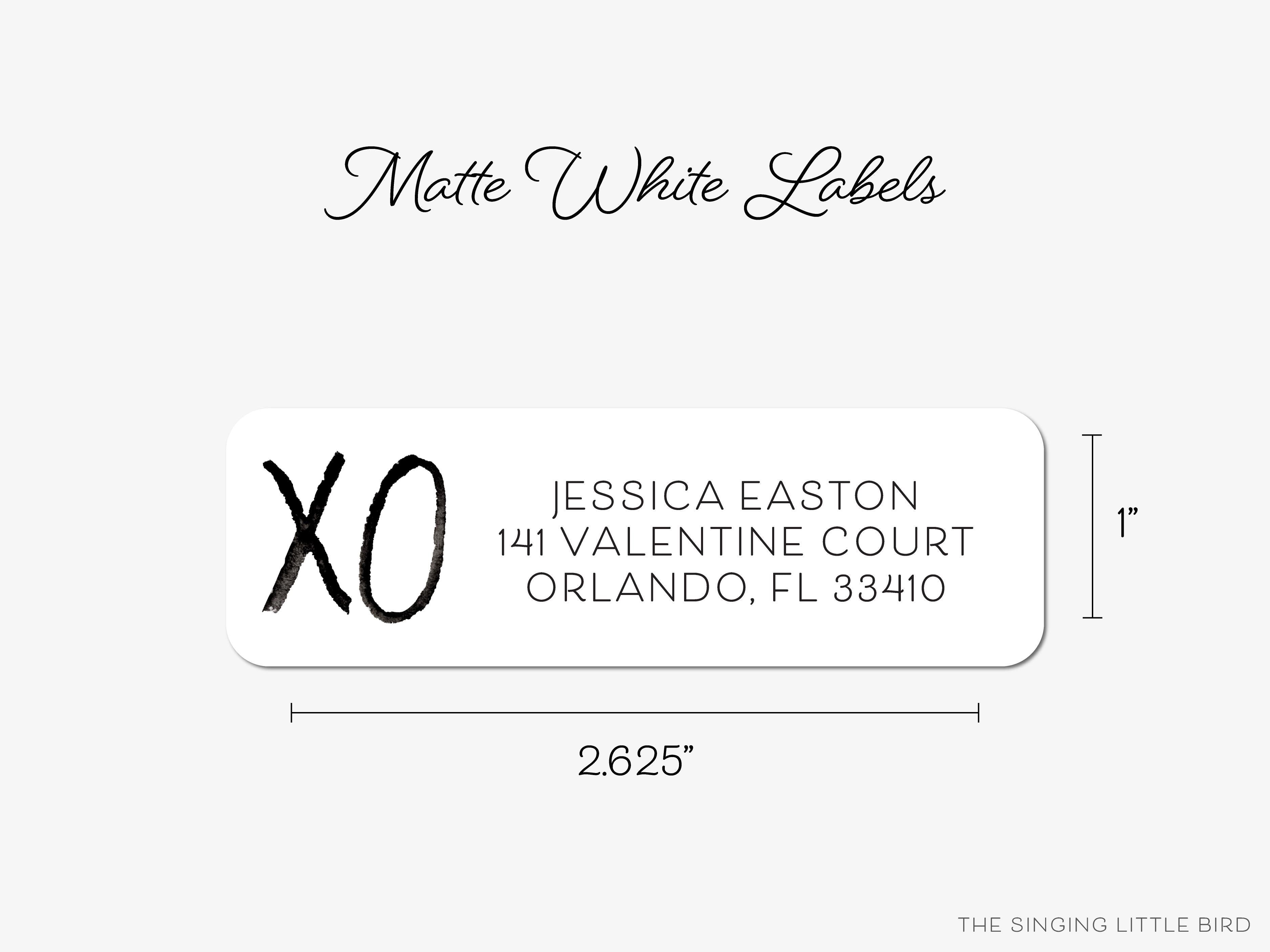 XO Black and White Return Address Labels-These personalized return address labels are 2.625" x 1" and feature our hand-painted watercolor XO, printed in the USA on beautiful matte finish labels. These make great gifts for yourself or the hugs and kisses lover.-The Singing Little Bird