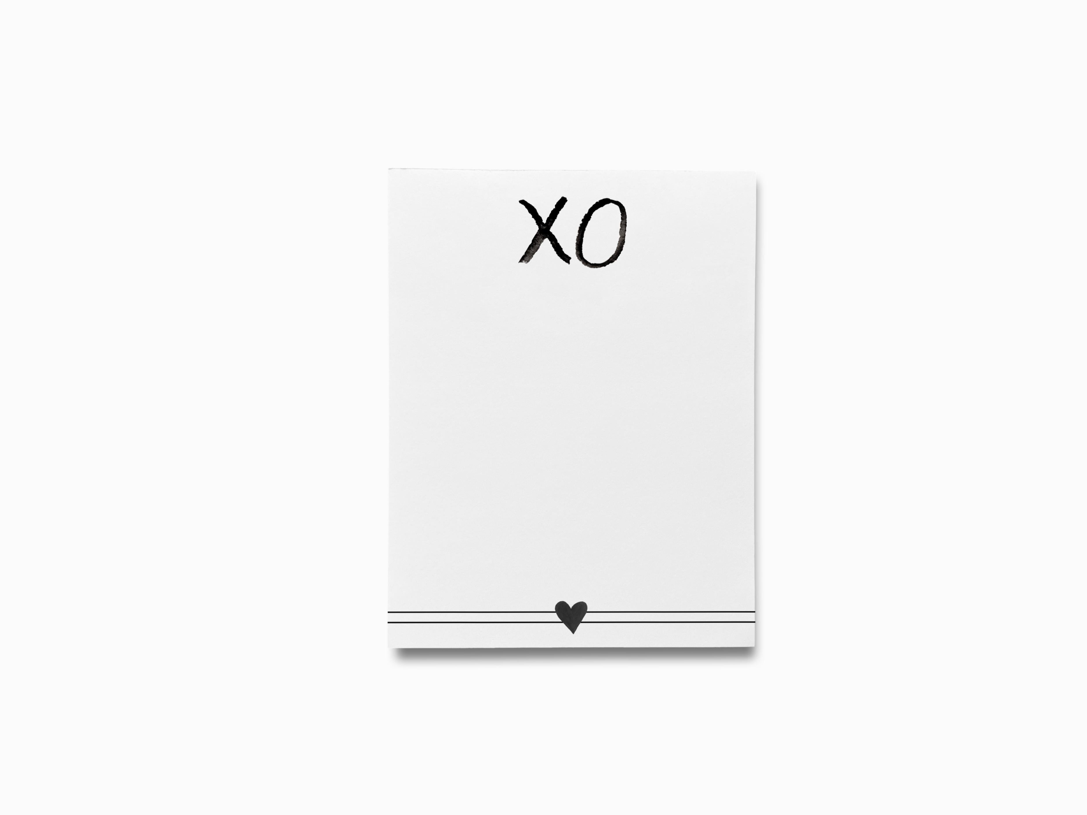 XOXO Black and White Notepad-These notepads feature our hand-painted watercolor xoxo, printed in the USA on a beautiful smooth stock. You choose which size you want (or bundled together for a beautiful gift set) and makes a great gift for the checklist and hugs and kisses lover in your life.-The Singing Little Bird