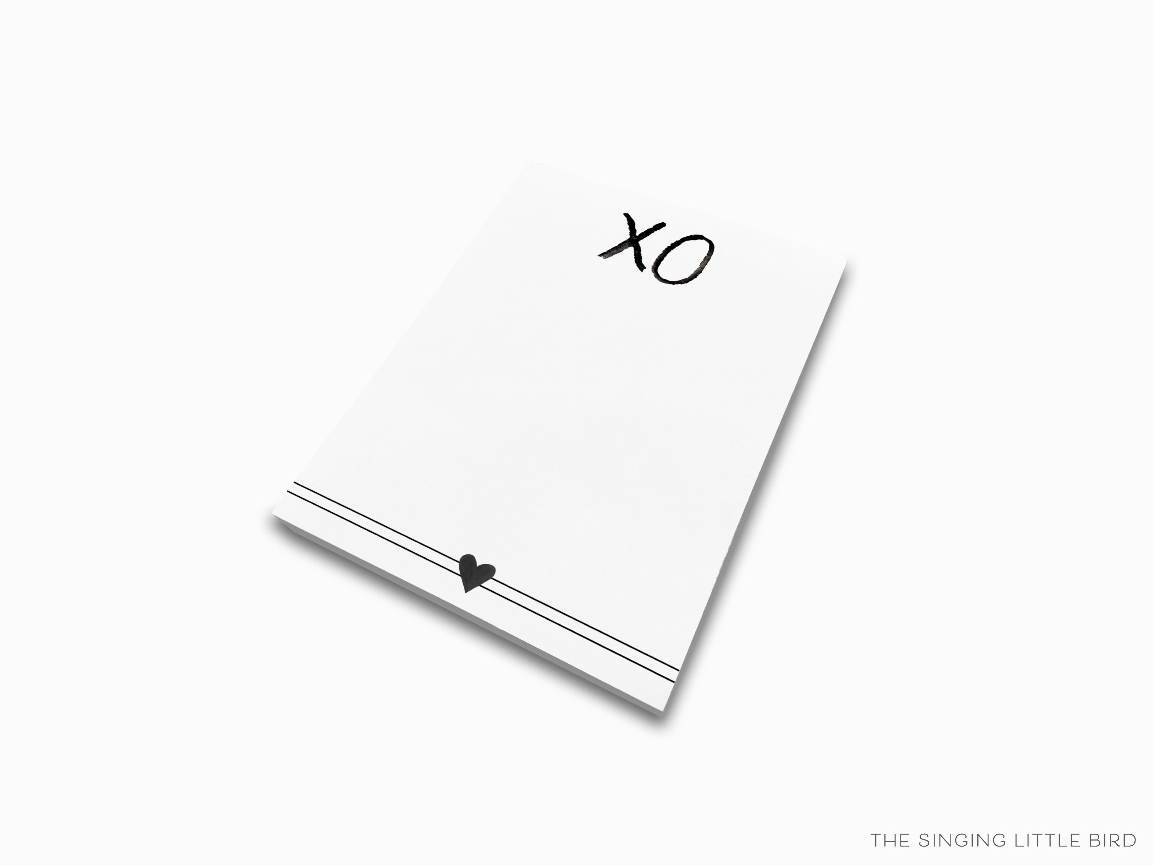XOXO Black and White Notepad-These notepads feature our hand-painted watercolor xoxo, printed in the USA on a beautiful smooth stock. You choose which size you want (or bundled together for a beautiful gift set) and makes a great gift for the checklist and hugs and kisses lover in your life.-The Singing Little Bird