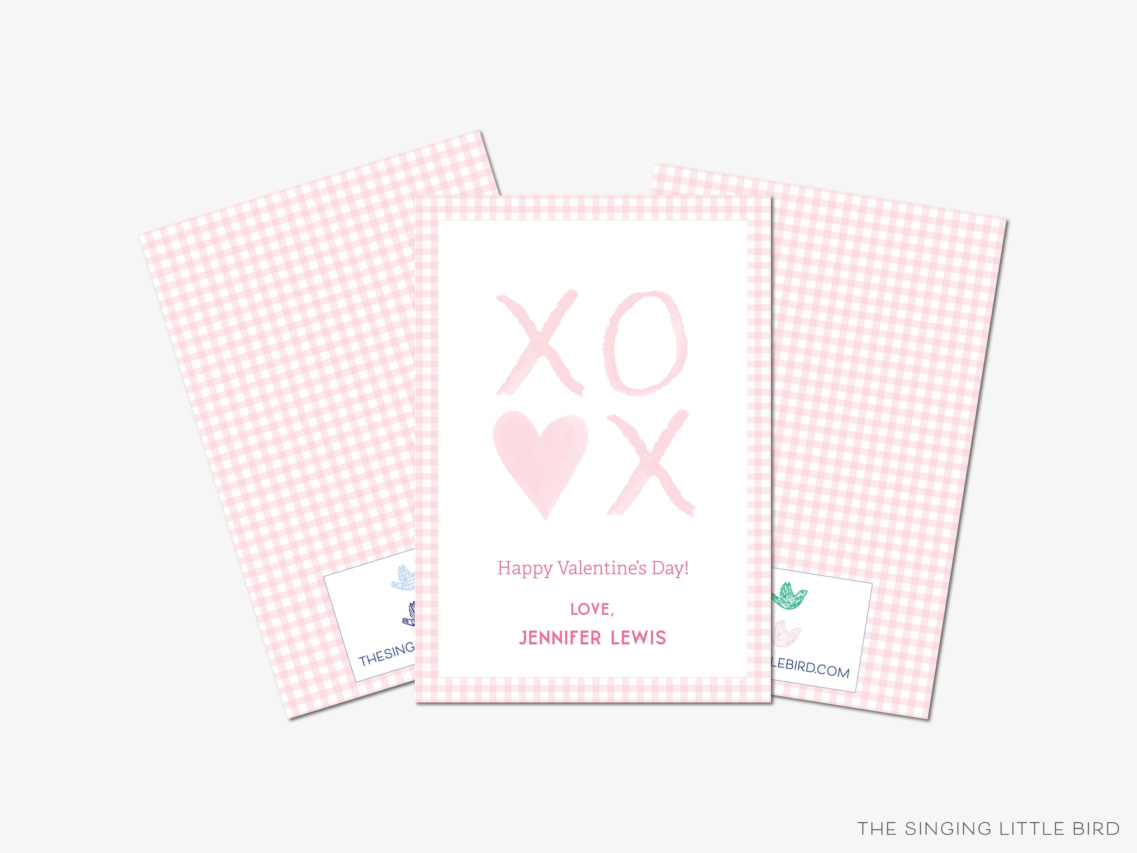 XOXO Pink and White Valentine's Day Cards-These personalized flat notecards are 3.5" x 4.875 and feature our hand-painted watercolor xoxo, printed in the USA on 120lb textured stock. They come with white envelopes and make great Valentine's Day cards for kids.-The Singing Little Bird