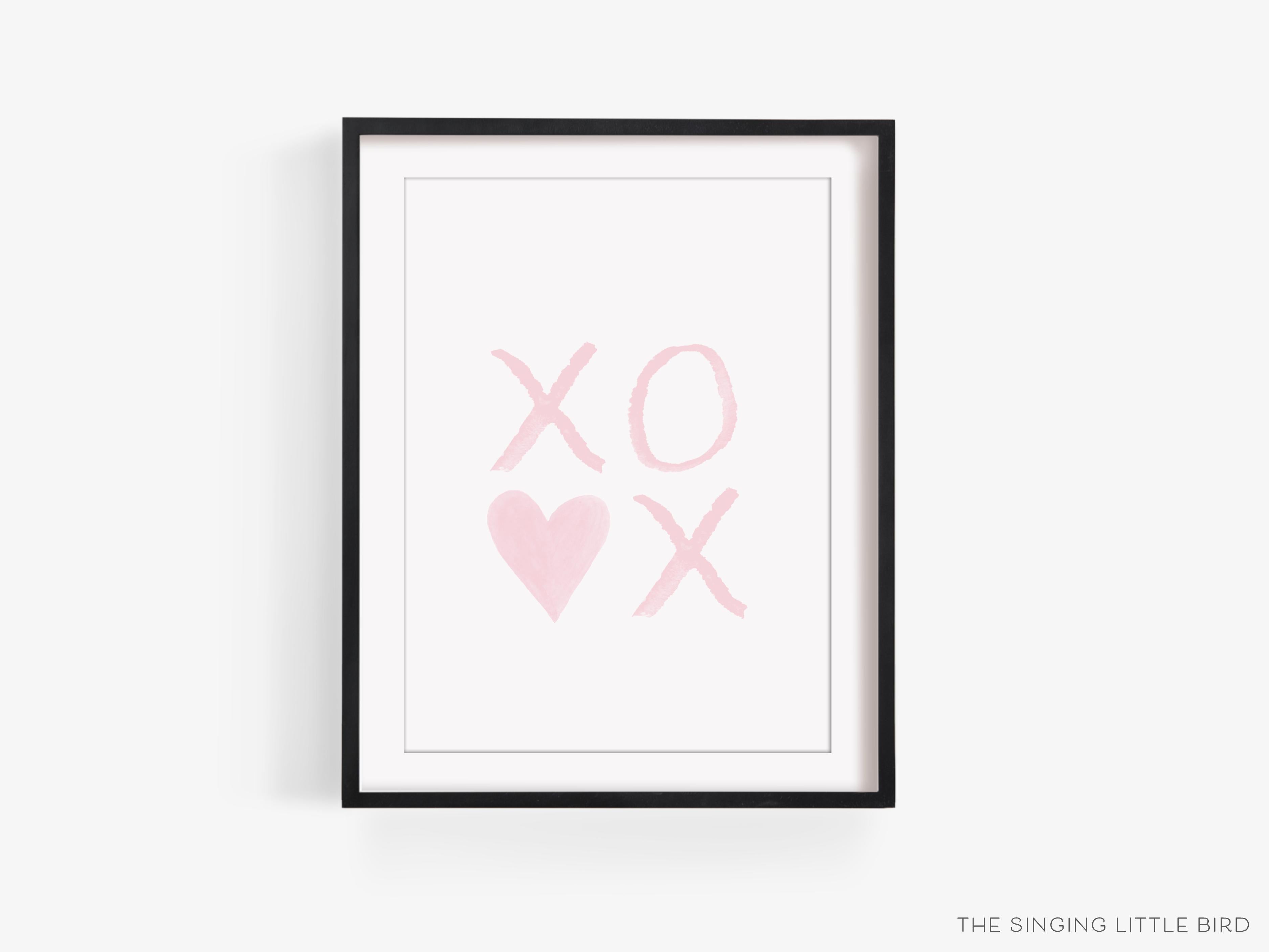 XOXO Pink with Heart Art Print-This watercolor art print features our hand-painted xo's and heart, printed in the USA on 120lb high quality art paper. This makes a great gift or wall decor for the hugs and kisses lover in your life.-The Singing Little Bird