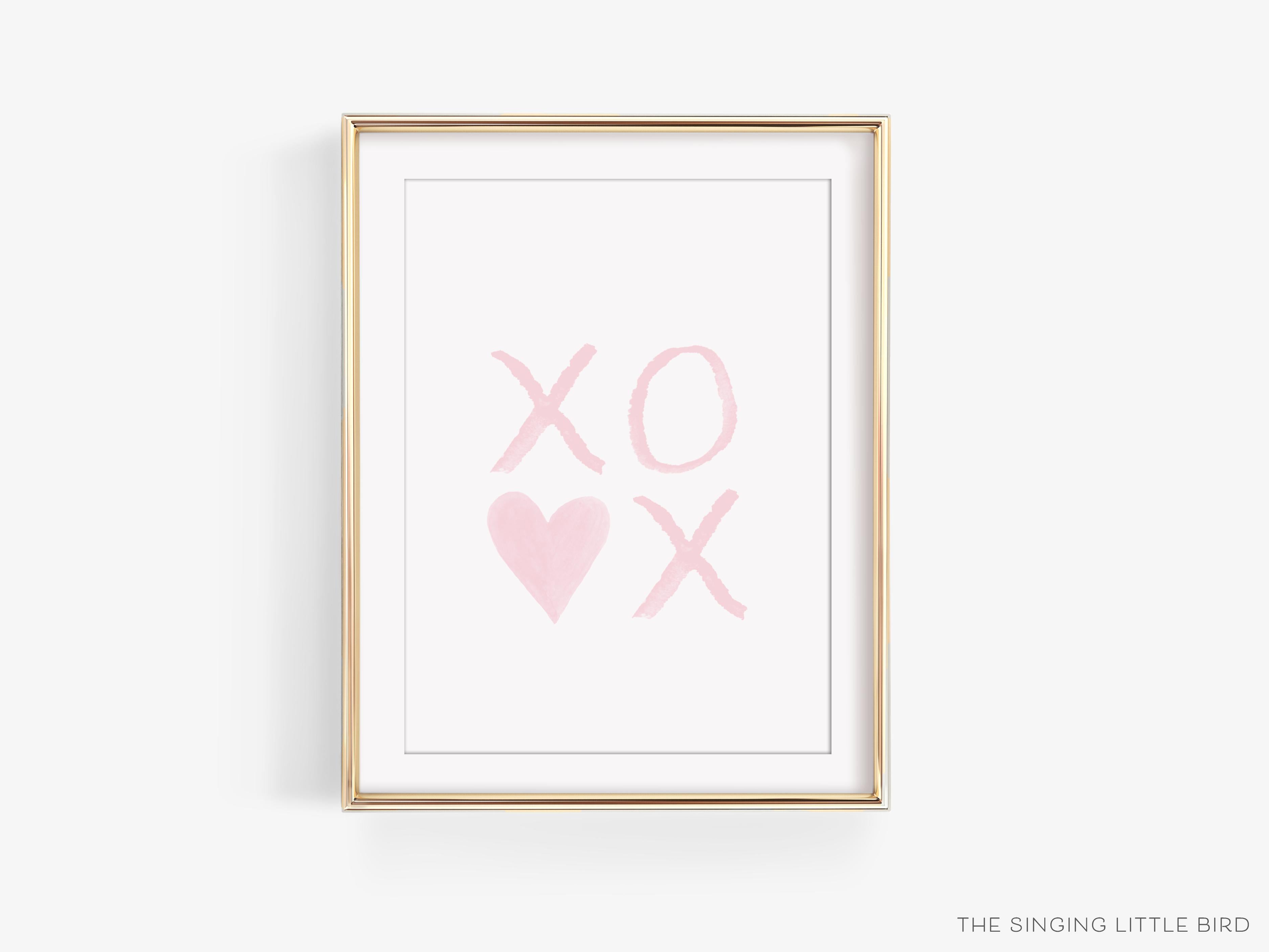 XOXO Pink with Heart Art Print-This watercolor art print features our hand-painted xo's and heart, printed in the USA on 120lb high quality art paper. This makes a great gift or wall decor for the hugs and kisses lover in your life.-The Singing Little Bird