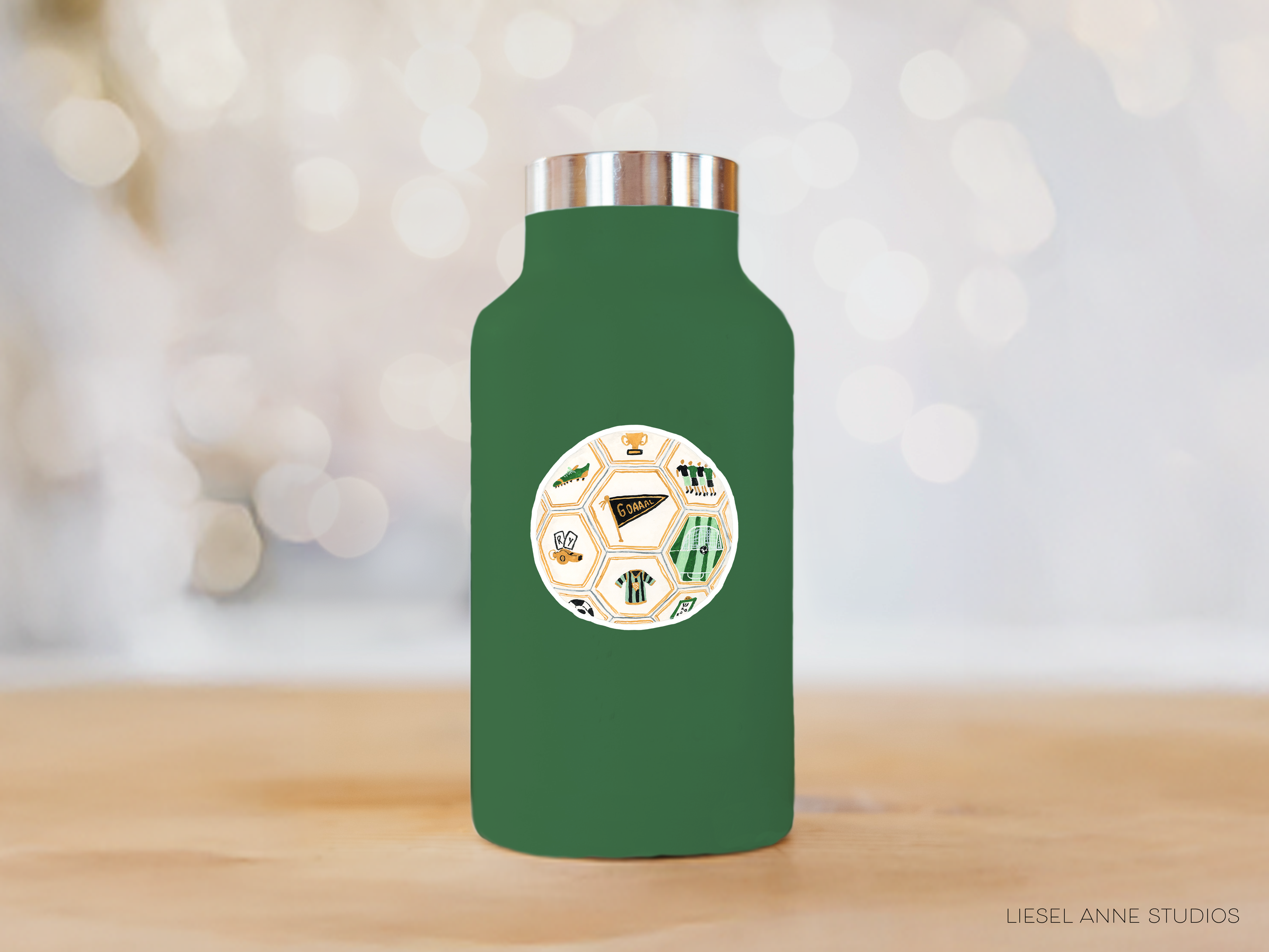 A green water bottle with a sticker featuring a soccer ball and various sports-related icons.