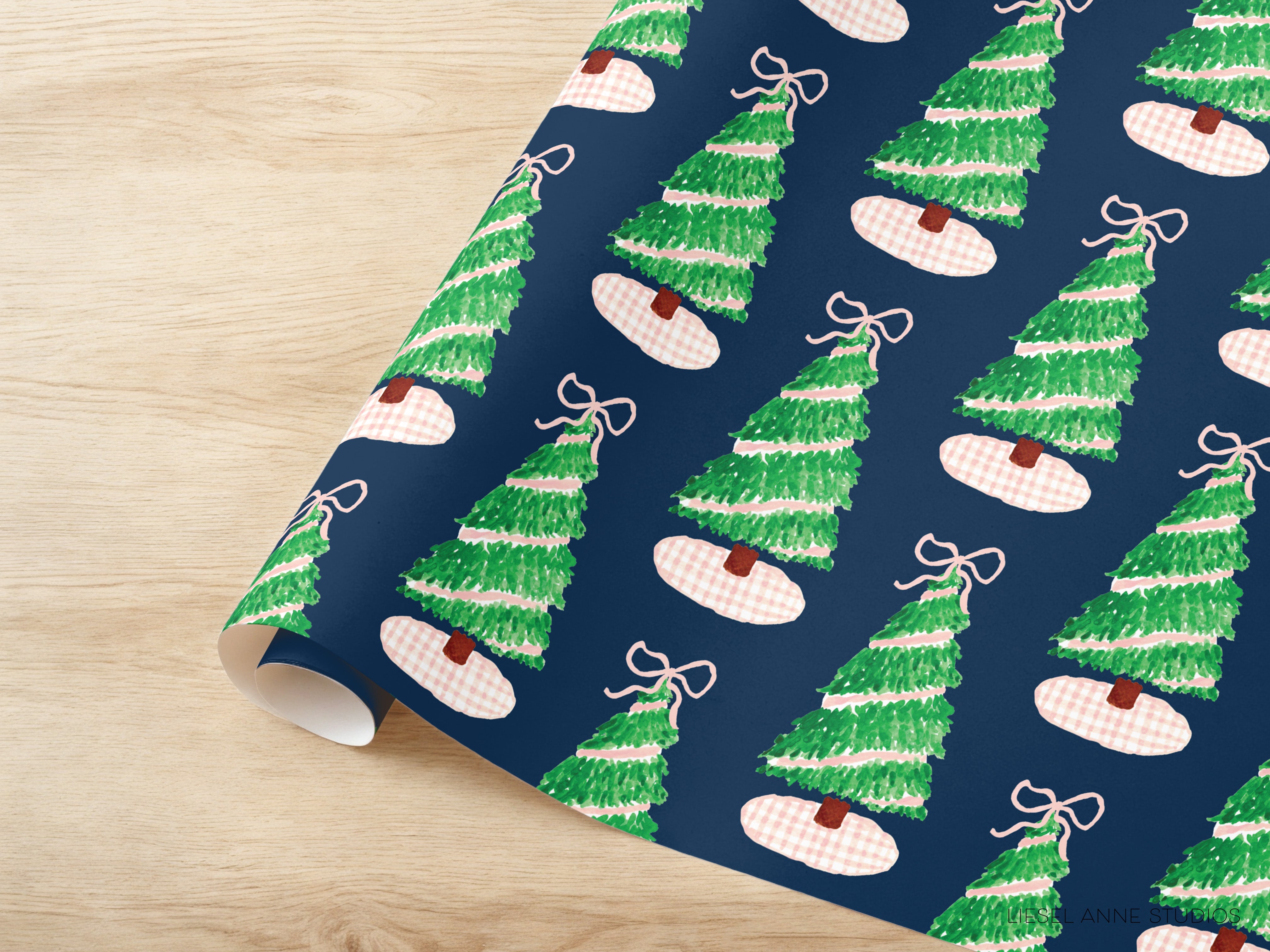 a pattern of Christmas trees with bows on a dark blue background.