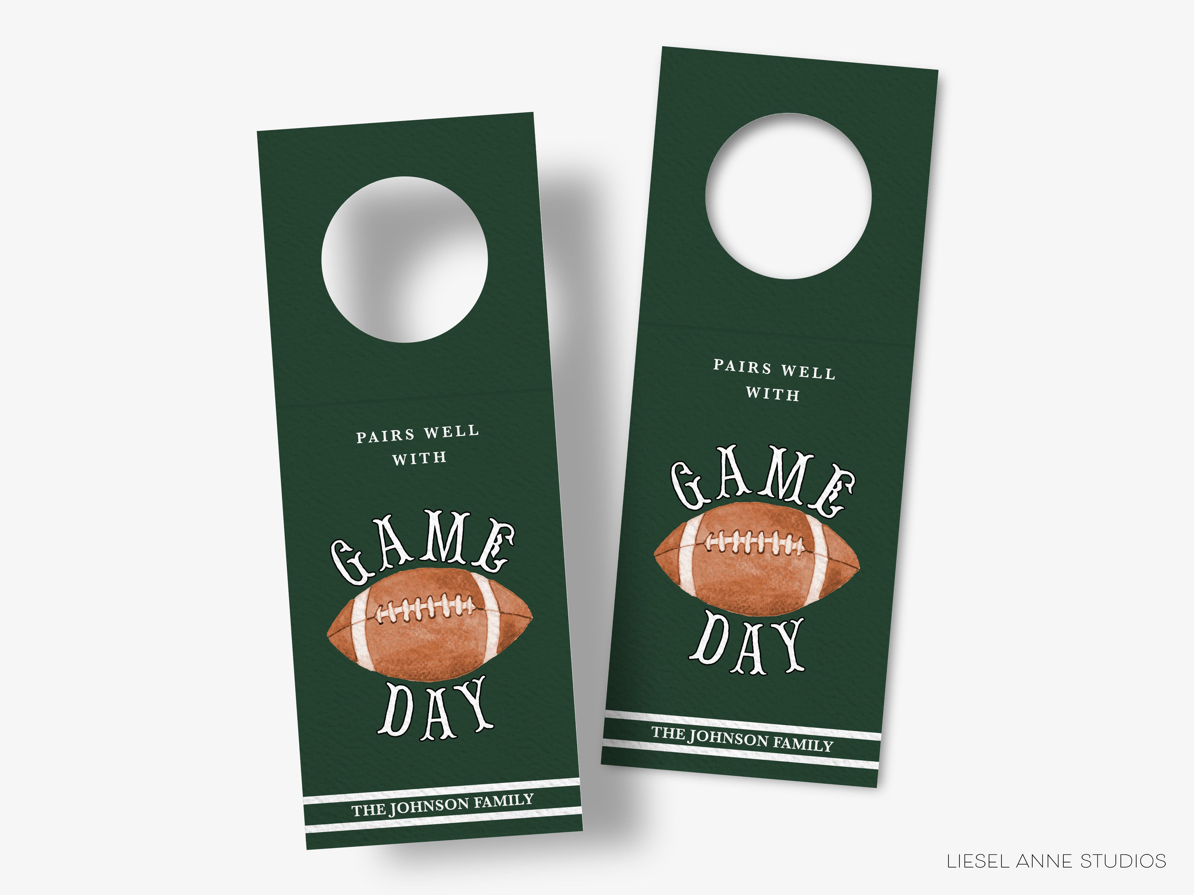 two green door tags with a football design and text related to a game day.