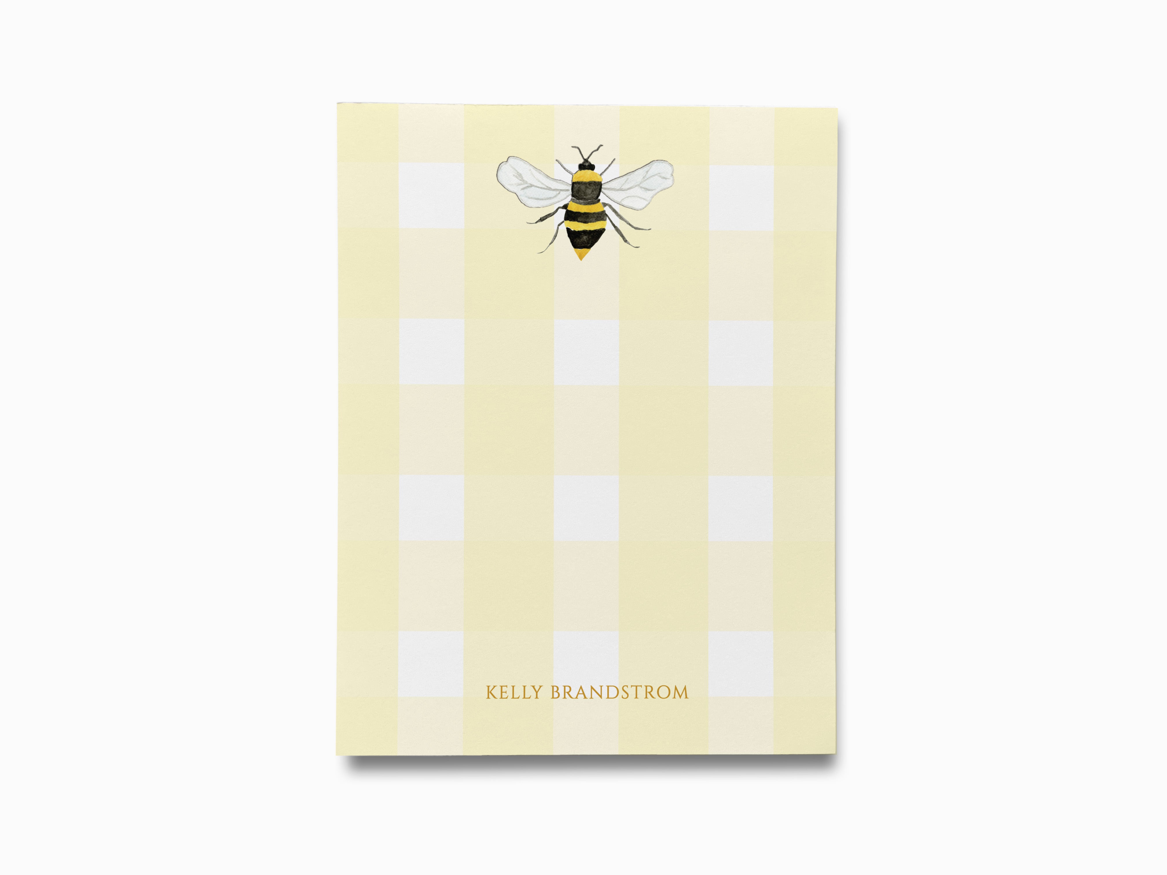 a yellow and white checkered background with a bee illustration in the center.