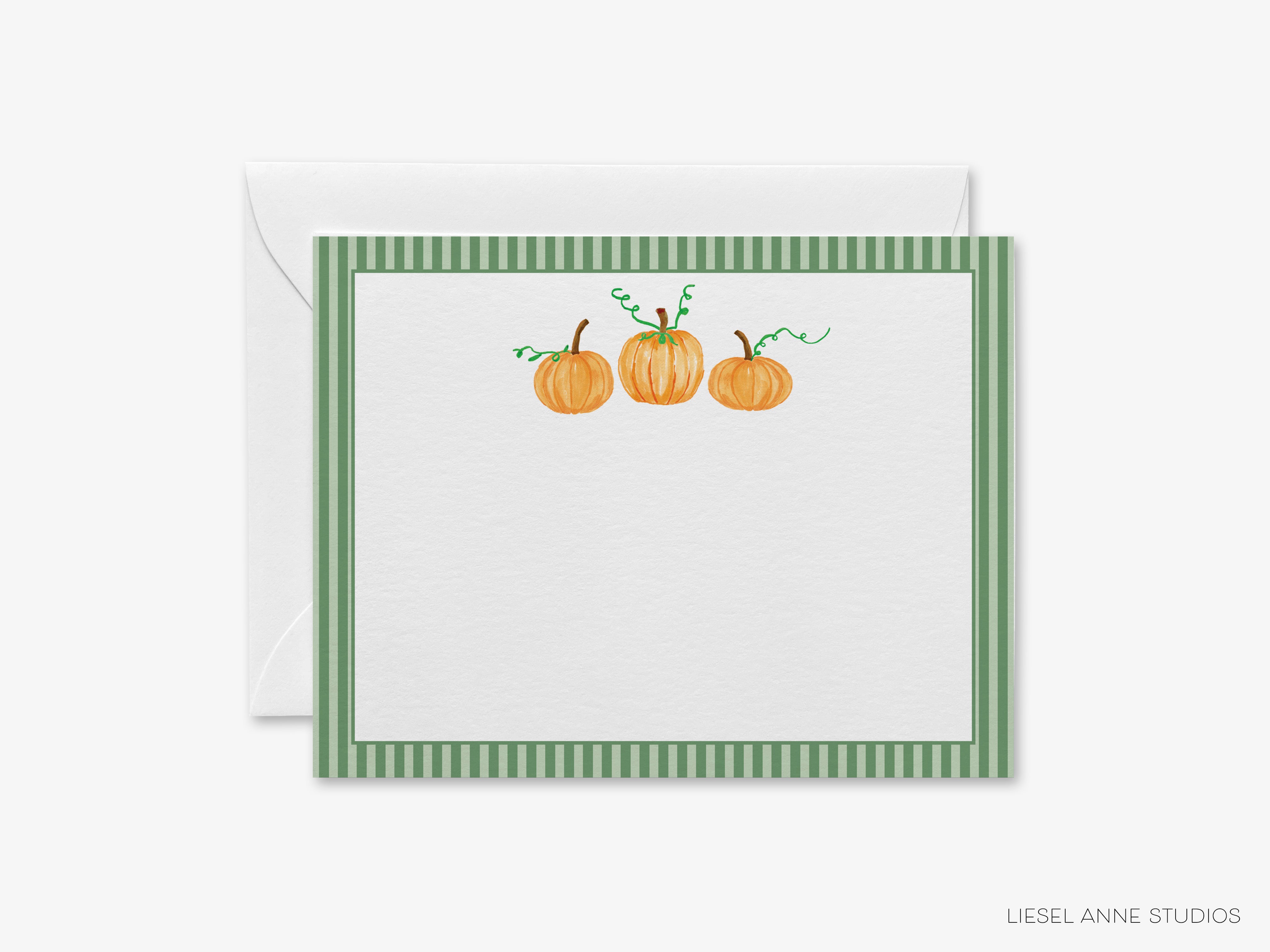 A greeting card with a green and white striped border and three orange pumpkins on a white background.